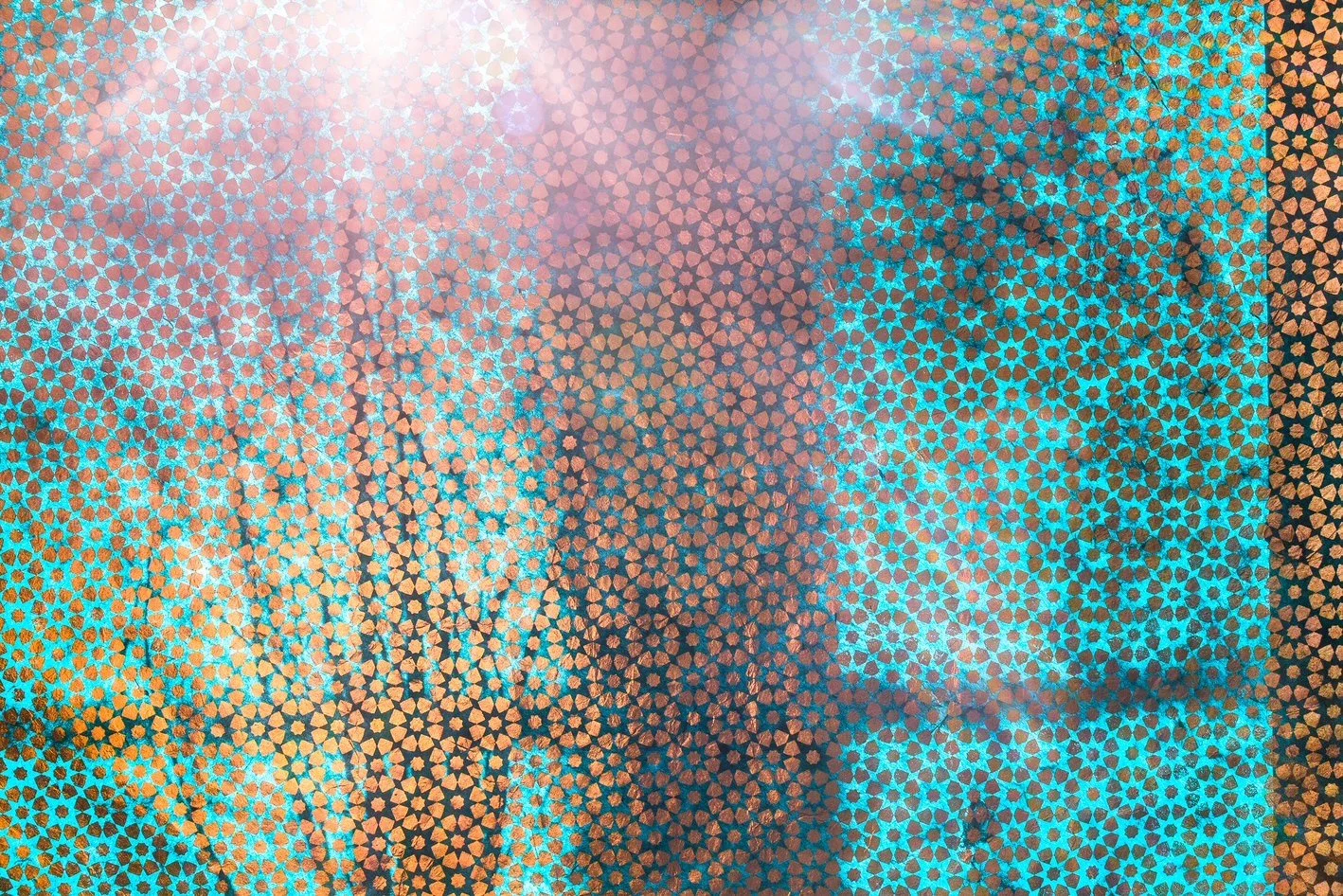 Close-up of a colorful, abstract mosaic pattern with overlapping triangular, star, and hexagon shapes in blue, orange, peach, and pink hues.