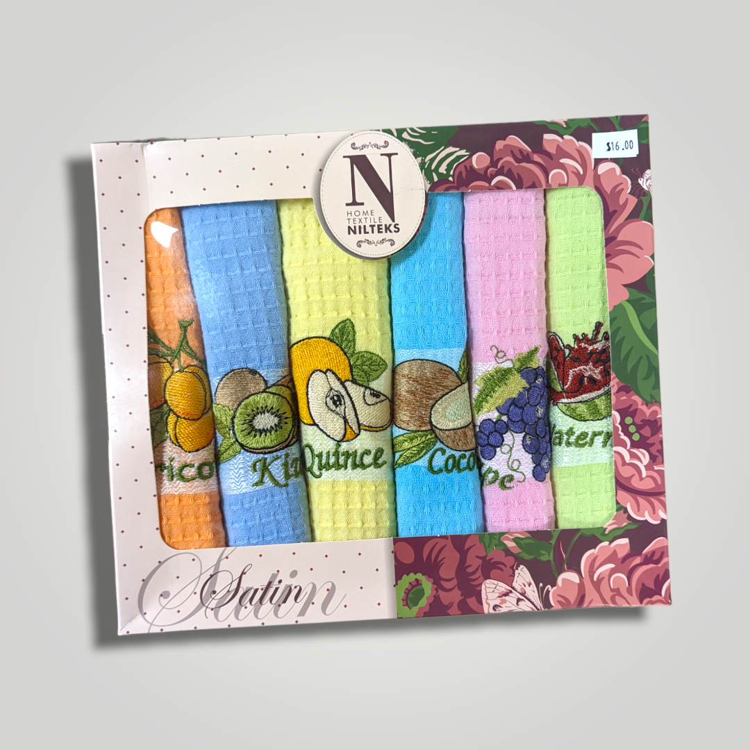Set of six colorful kitchen towels with fruit and vegetable embroidered designs, displayed in a decorative box.