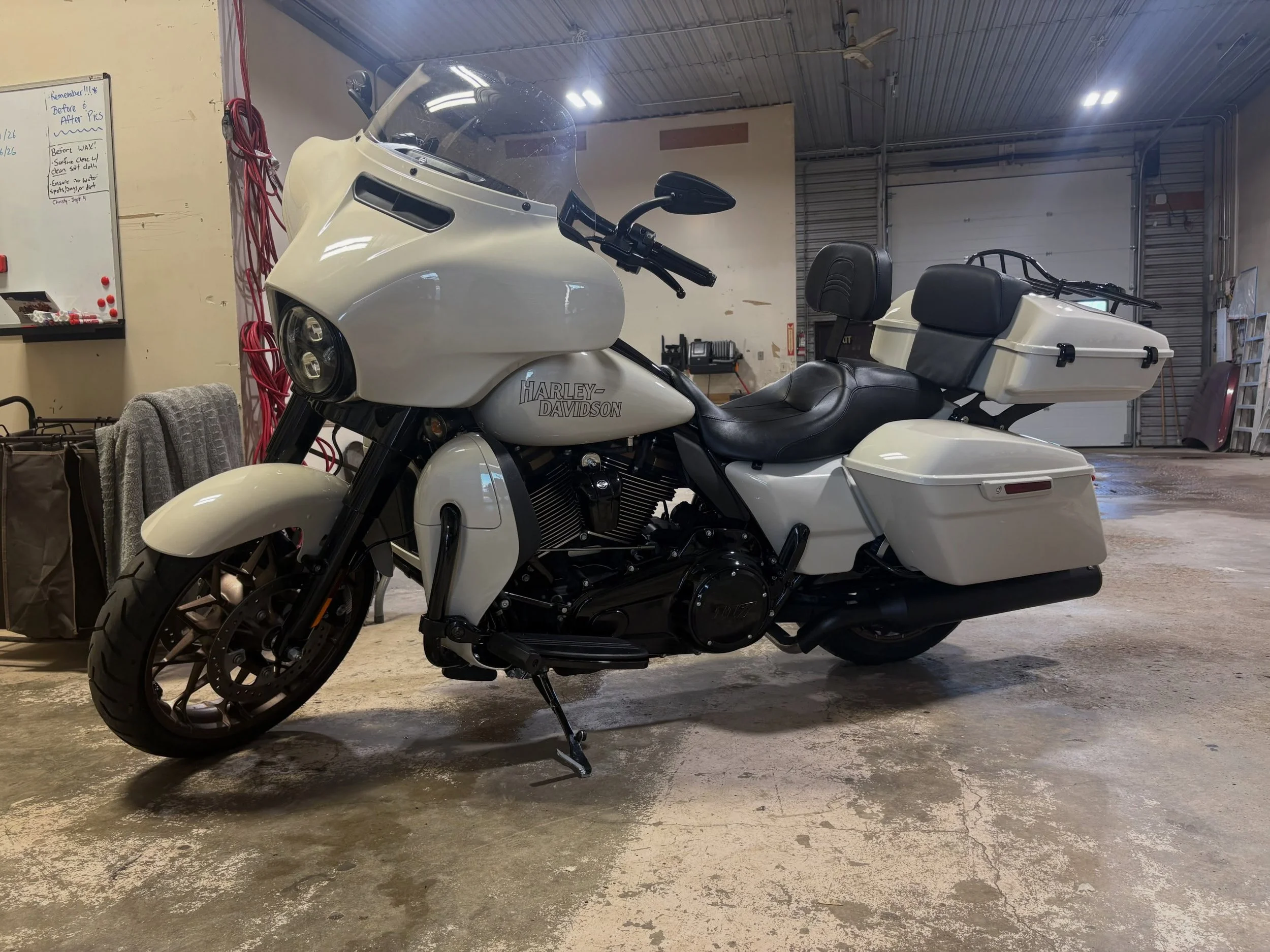 We installed paint protection film on the high-impact areas to help defend that pearl white finish from rock chips, road debris and everyday wear, then topped things off with a ceramic coating for added gloss, slickness and easier maintenance.

PPF p