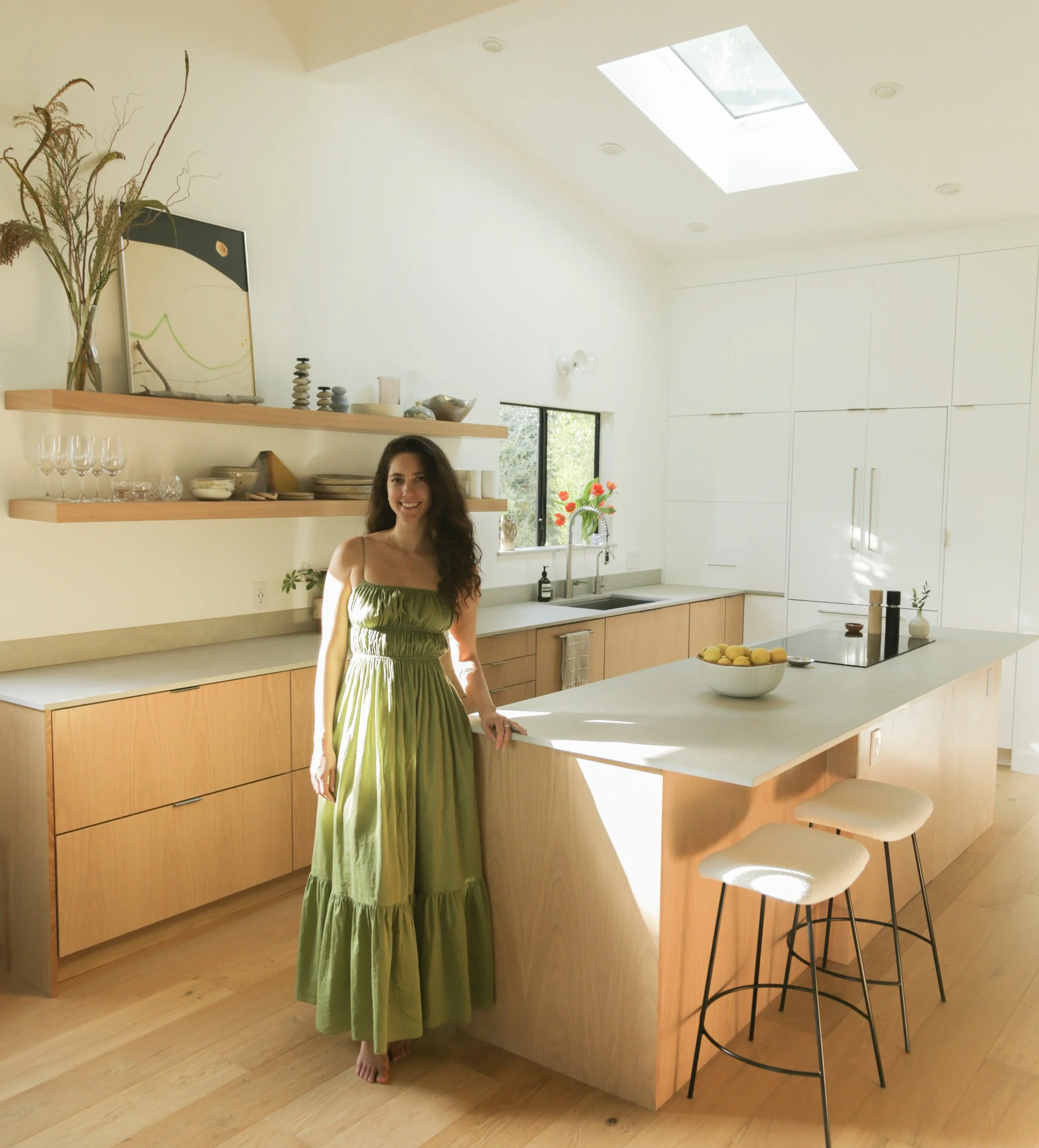Abi Bock, founder of Homing Interiors, inside a Los Angeles Airbnb