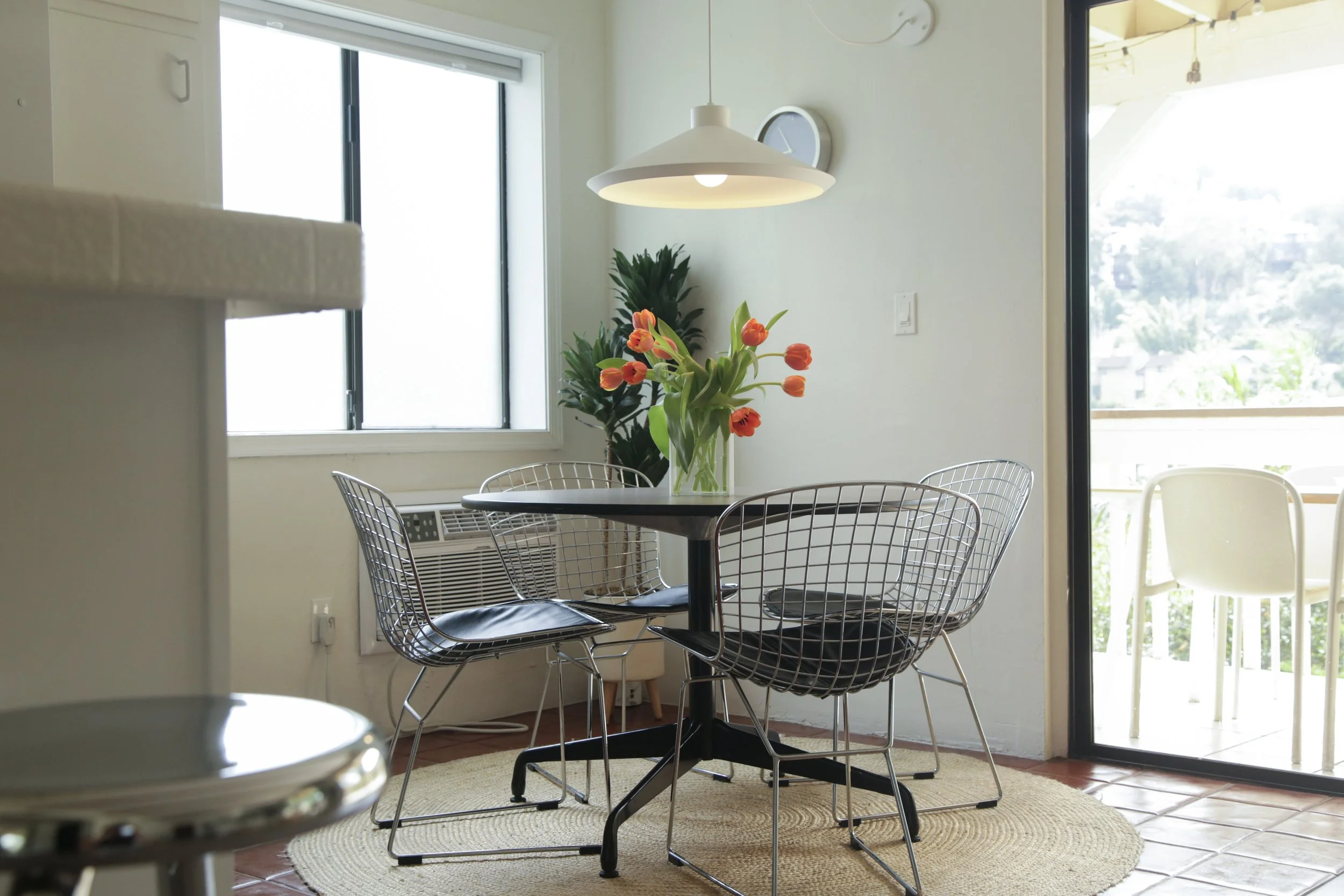 Guest-ready dining area created as part of an Airbnb design and setup project
