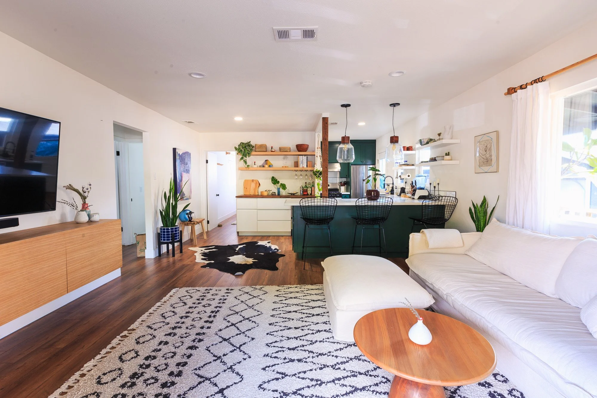 Bright living room airbnb 1920s silver lake bungalow, styled by homing interiors.