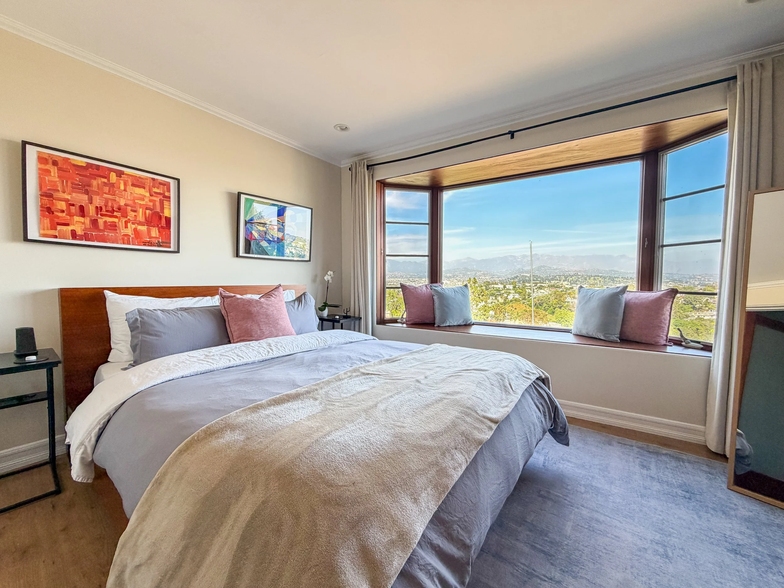 Bedroom airbnb with views of Northeast LA short-term rental in los feliz, designed by Homing Interiors.