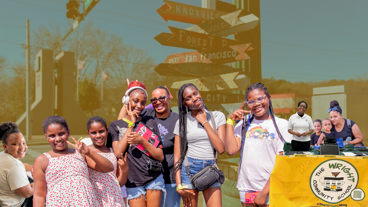 Students with WCS at a community event in Forest Park