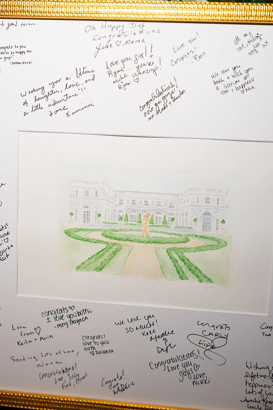 A custom venue portrait from Lemoie Creative as the guest book