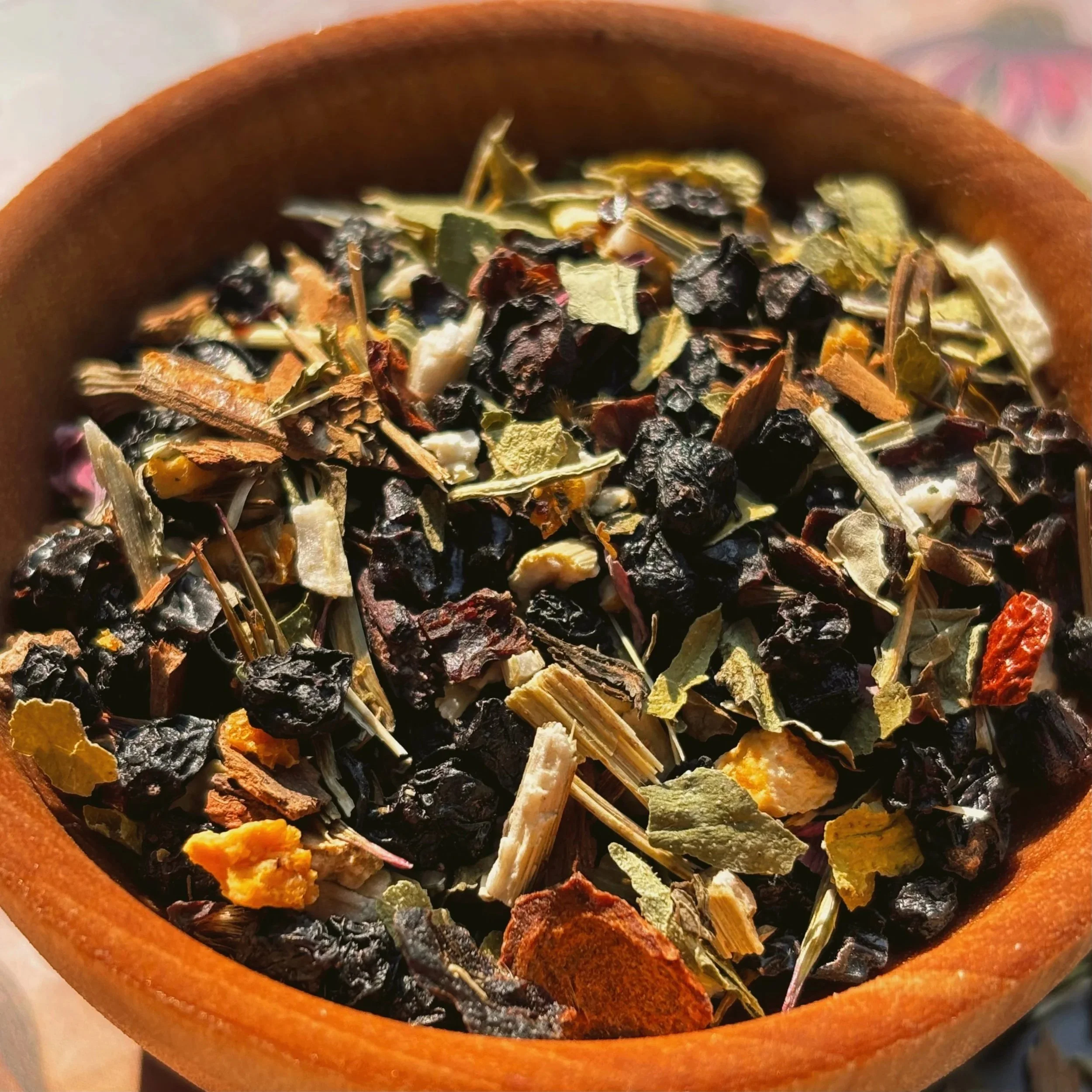immunity blend of herbs like elderberry, echinacea, rosehip, orange, lemon balm, ceylon cinnamon loose leaf herbal tea blend