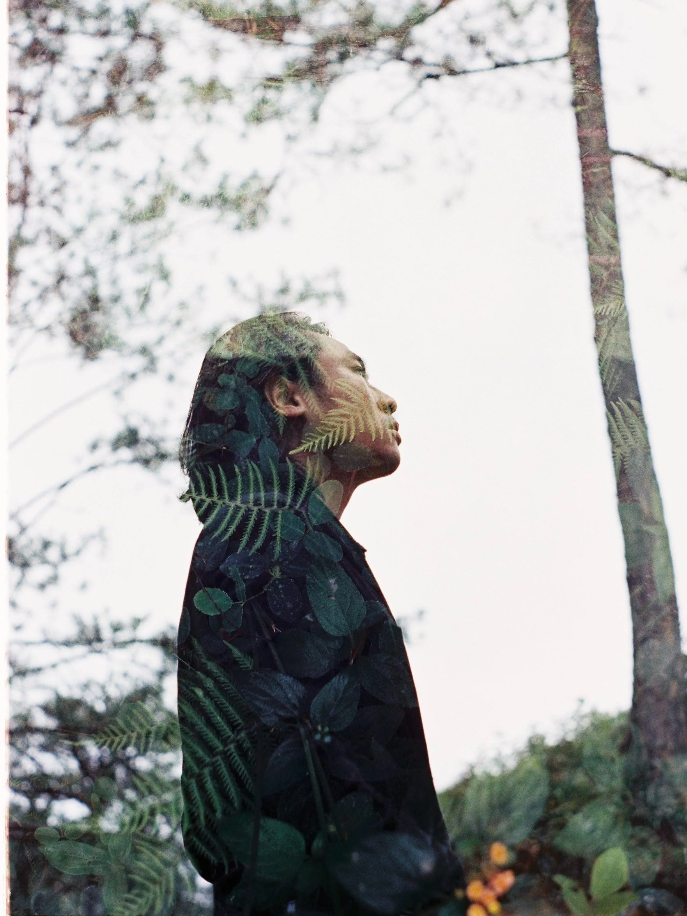 Double exposure image of a man looking into the distance representing the feeling of being depressed