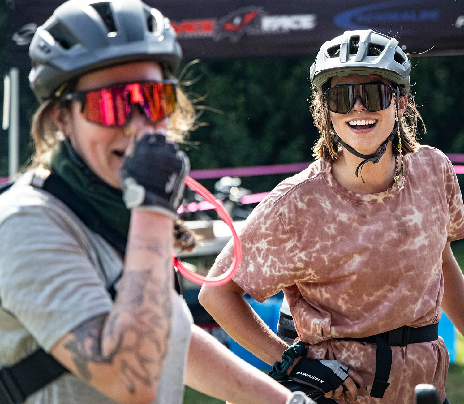 Two riders share a big smile after a great day of gravel riding