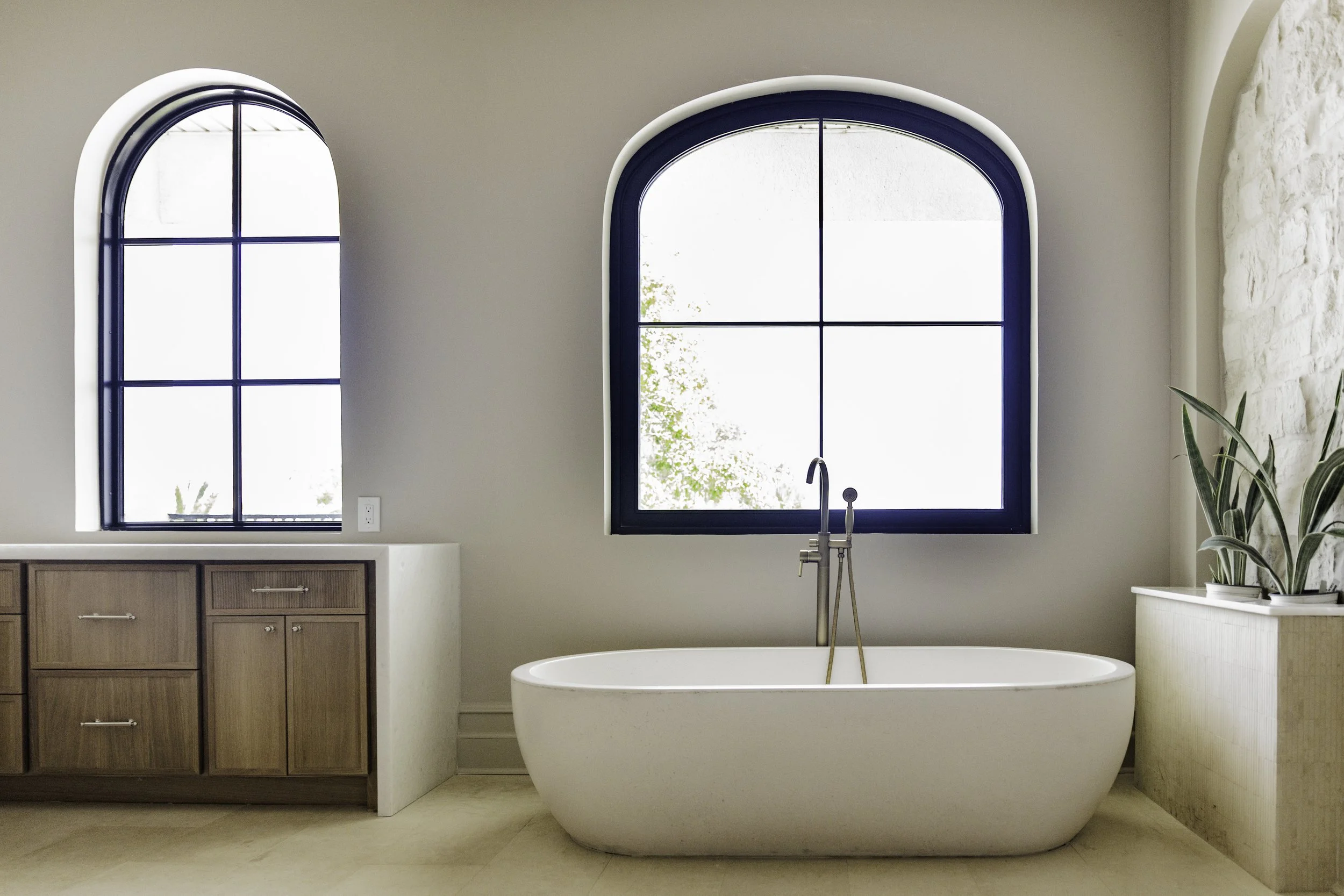 aunty_J_Interiors_Destin_FL_Concrete_Bathtub_primary.jpg