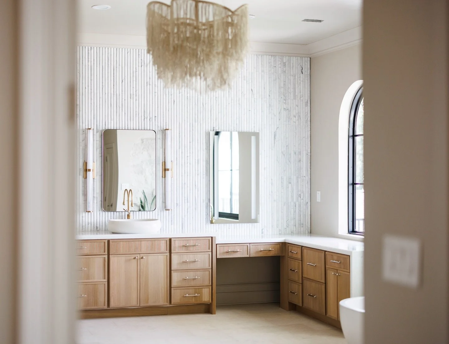 This primary bath at Destin Bay didn&rsquo;t come together overnight. It was sketches and samples, long conversations about textures, light, and how the room should feel at the end of the day.

Now, it simply feels calm, grounded, and a little bit ma