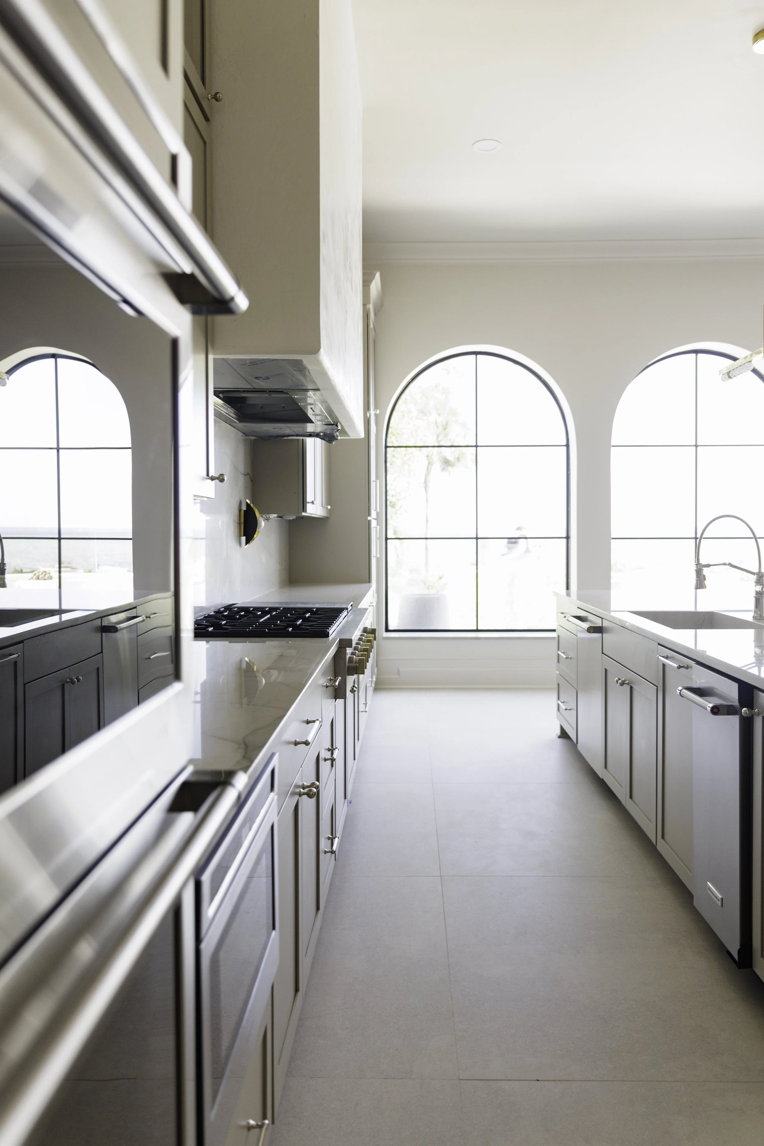 aunty_J_Interiors_Destin_FL_Kitchen_Arch_Windows.jpg