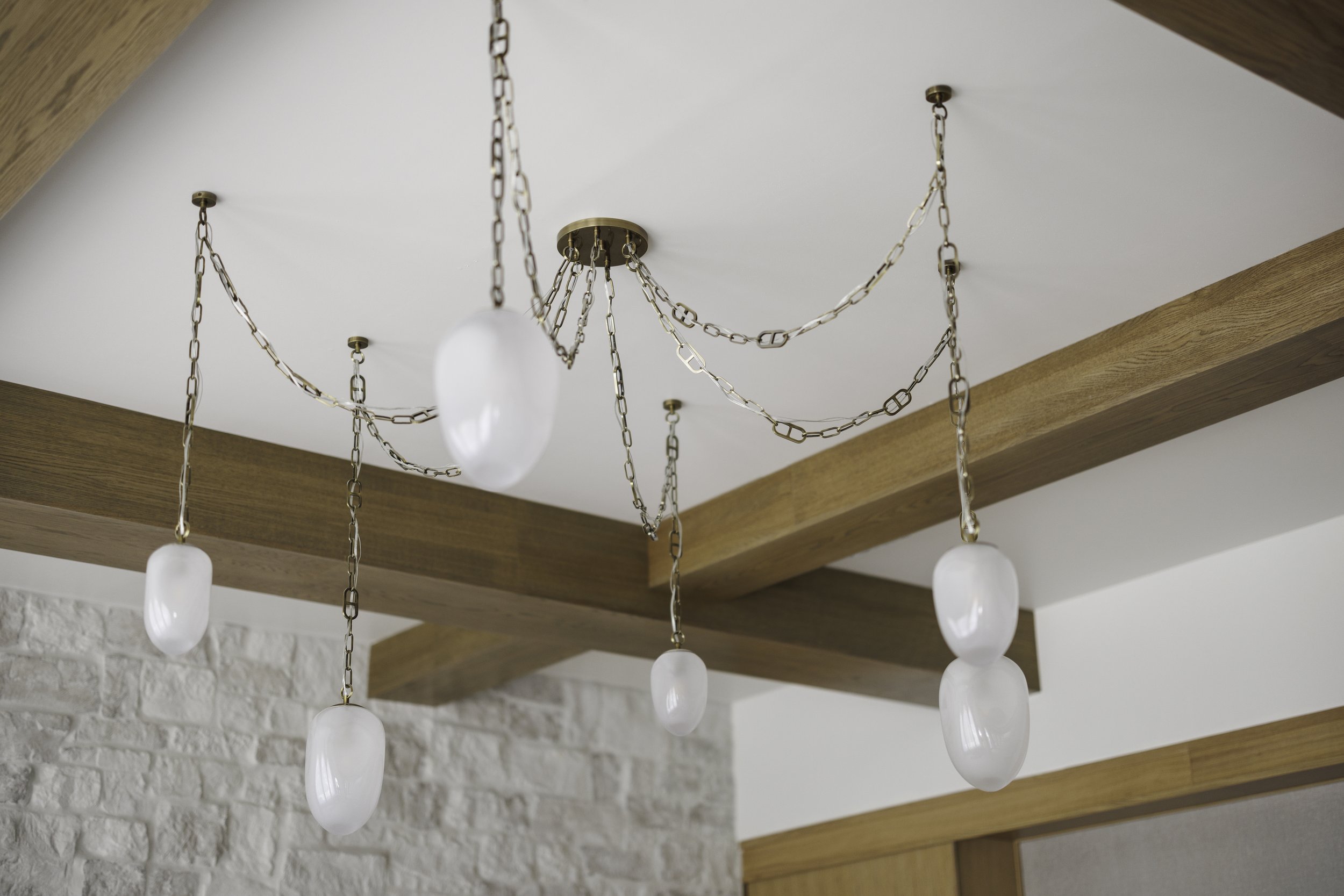 aunty_J_Interiors_Destin_FL_Den_Draped_Chandelier.jpg