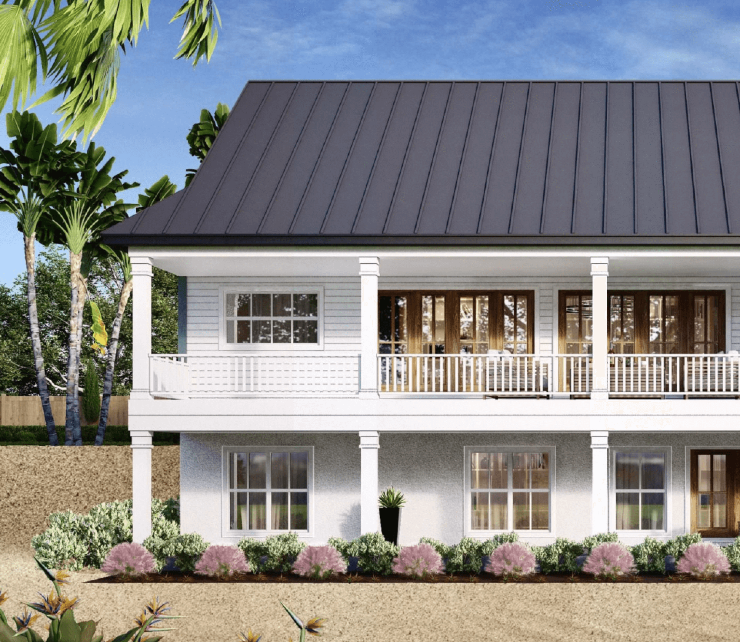Front view of a two-story house with white exterior, dark metal roof, large windows, and a front porch with white railings, surrounded by landscaped garden and trees.