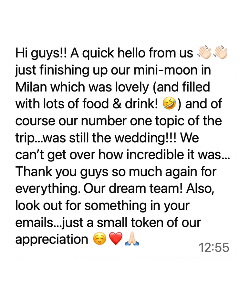 A text message sharing a cheerful update about completing a mini-moon in Milan, which was lovely and filled with food and drinks. The message mentions the wedding as the main topic of the trip and expresses gratitude to the team, with emojis of hands clapping, a laughing face, a heart, a prayer, and a blue sprout.