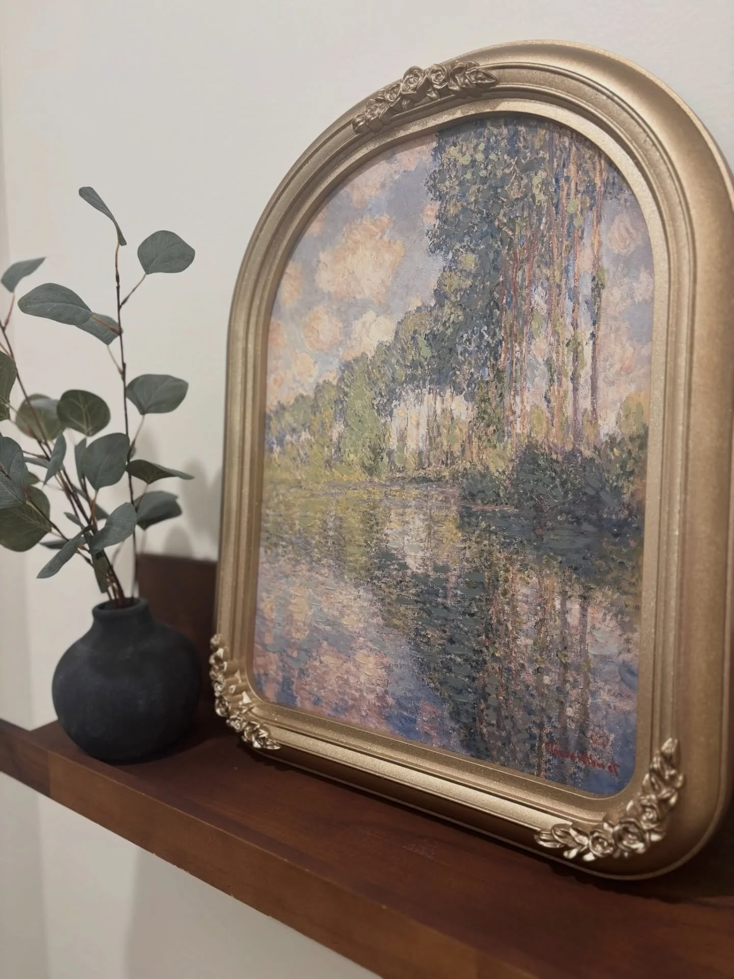 You don&rsquo;t always have to hang your artwork. Some of the best styling moments happen when you lean and layer pieces on shelves, consoles, and nightstands. It gives your space that effortless, collected feel.

Here is how to lean and layer like a