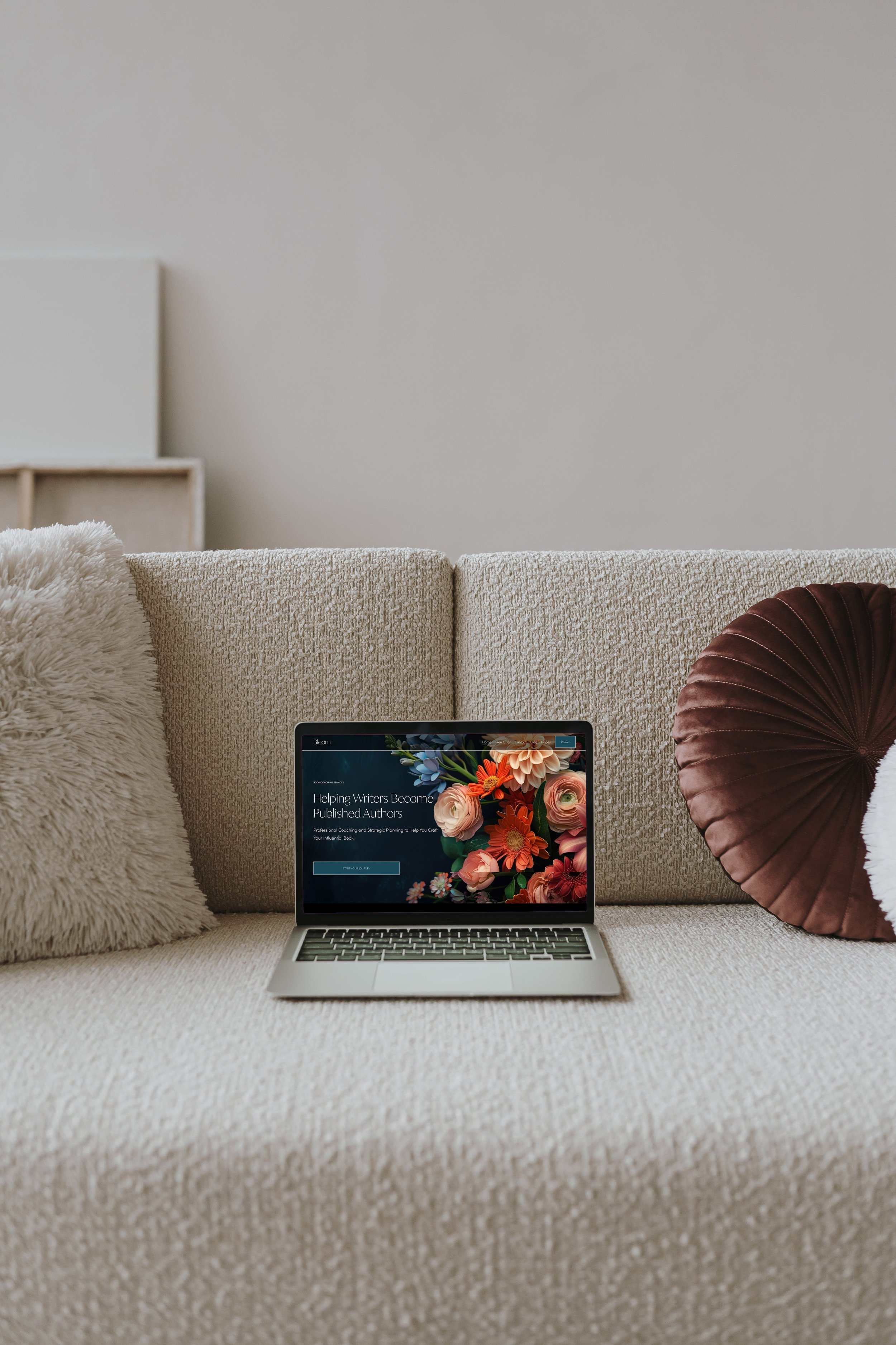 bloom-laptop-mockup-on-couch.jpg