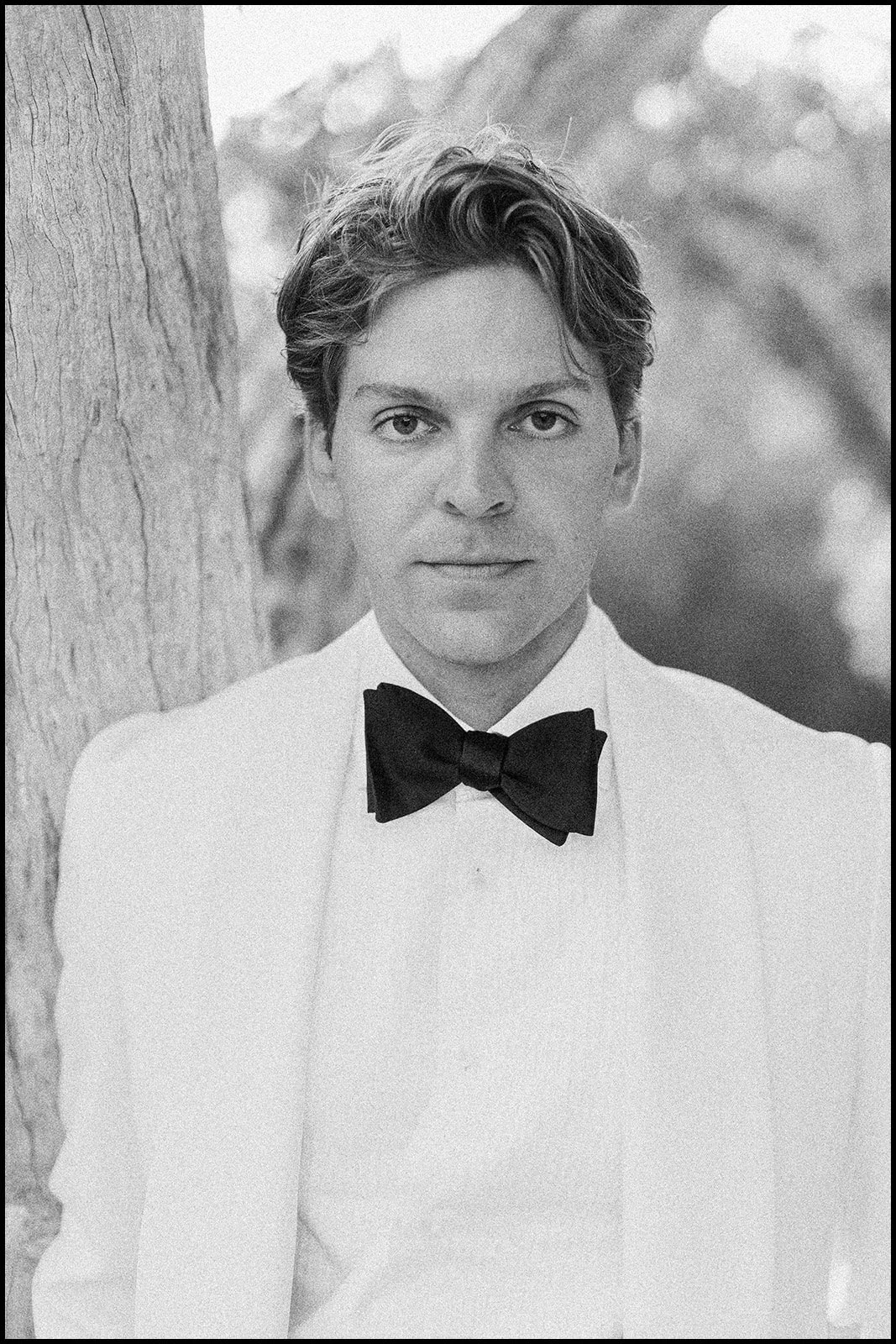 Groom portrait on film by Ammonite Stories