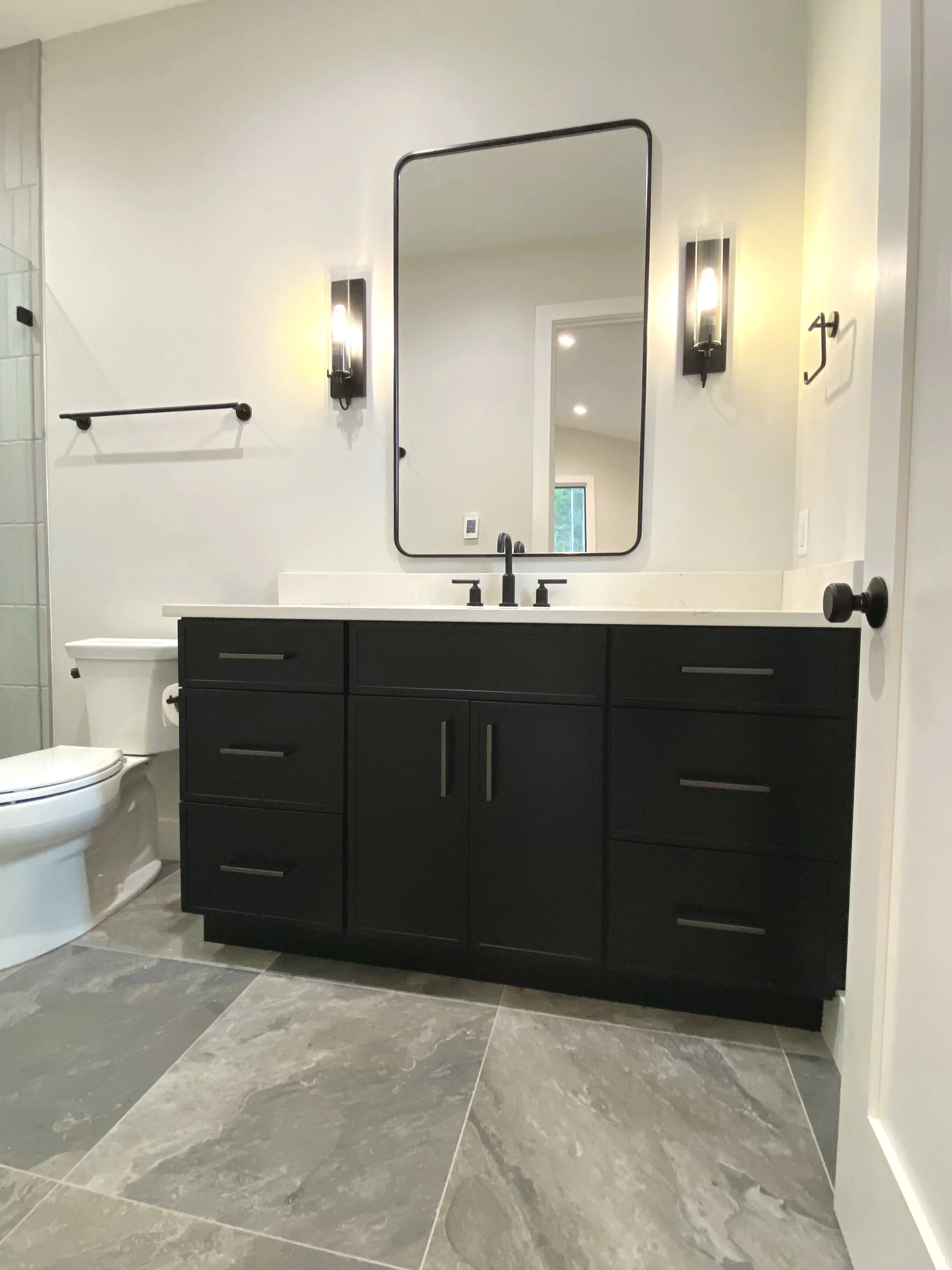Beautiful bathroom in barndominium apartment in Madison County North Carolina built by Plumb Level Square