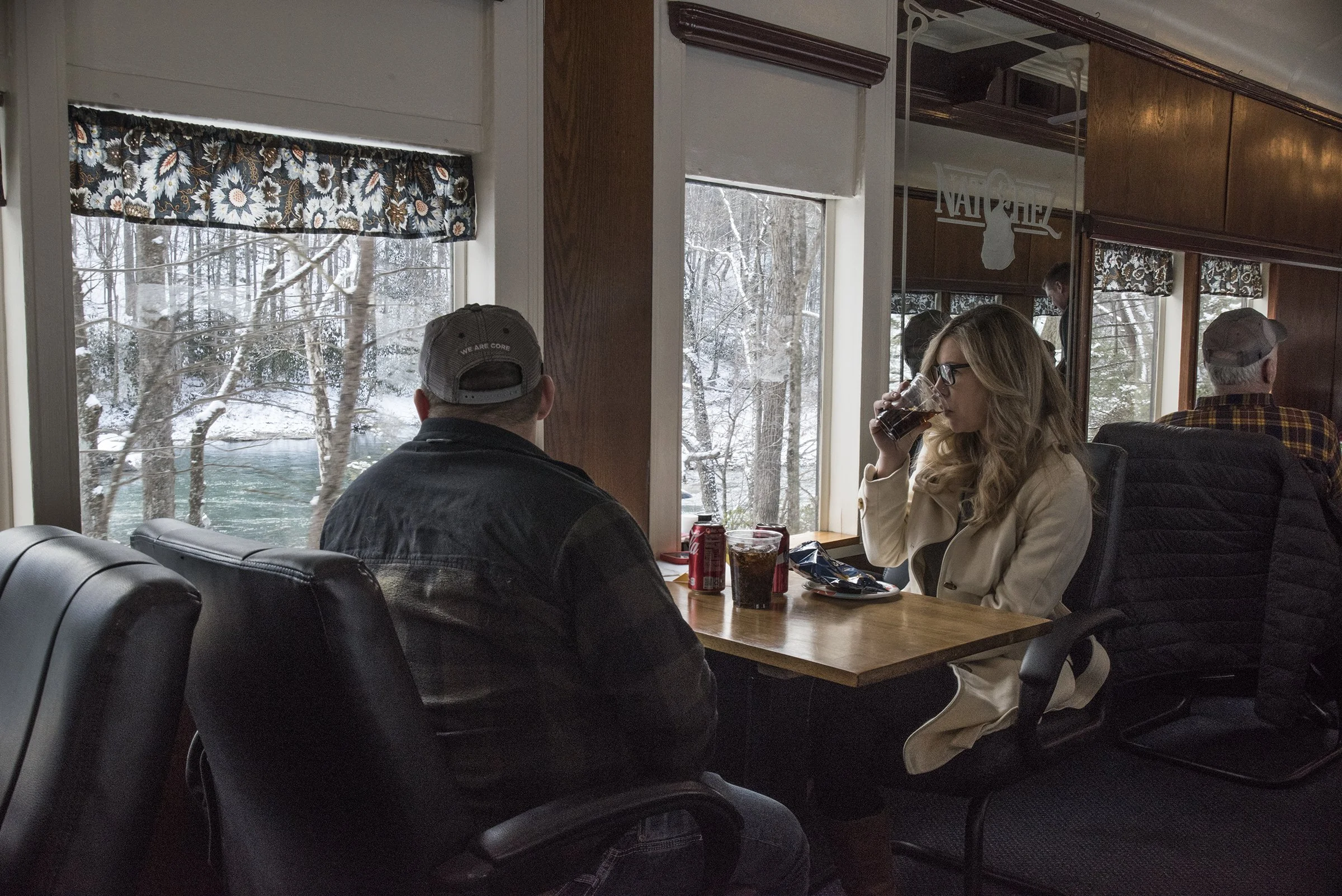 Enjoying the view while in heated comfort abord the train's parlor car