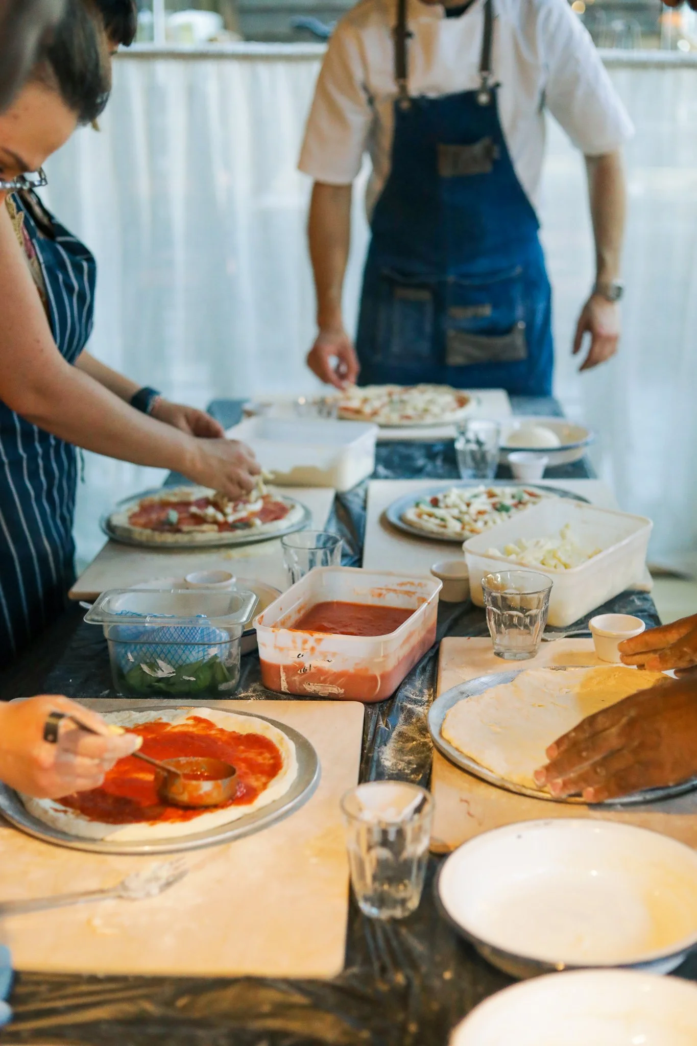 Pizza and dough making ALFI Italian Restaurant
