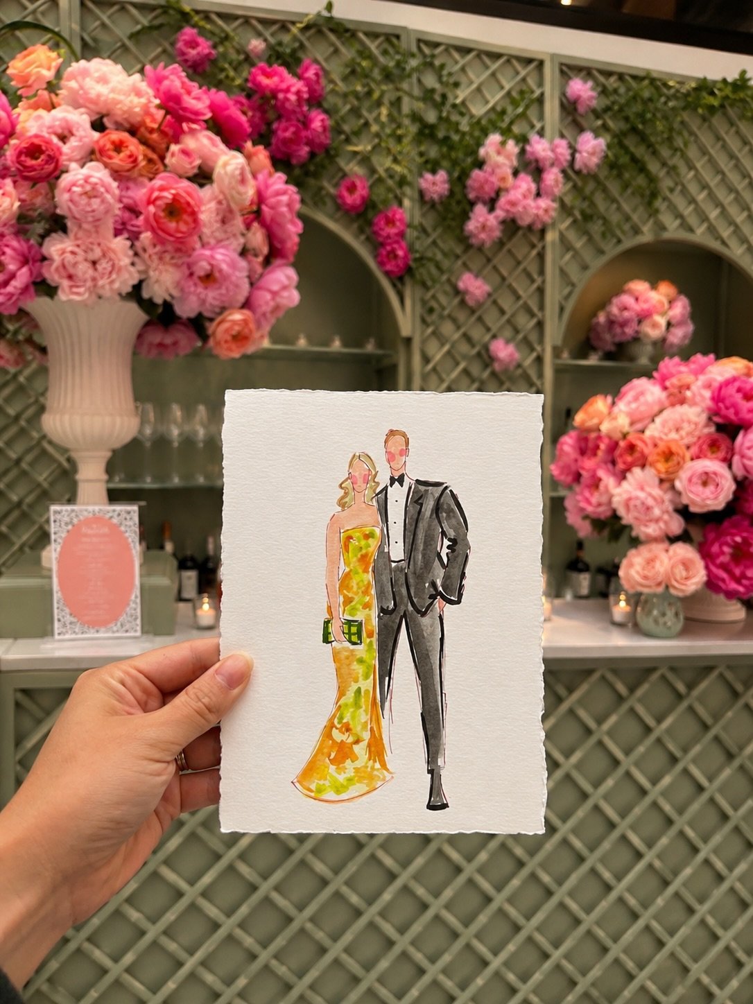 The Petroleum club of Midland transformed into a garden of peonies, candlelight, and soft spring colors.

While guests celebrated, we painted watercolor portraits throughout the evening, capturing a few of the stylish looks and special moments that m