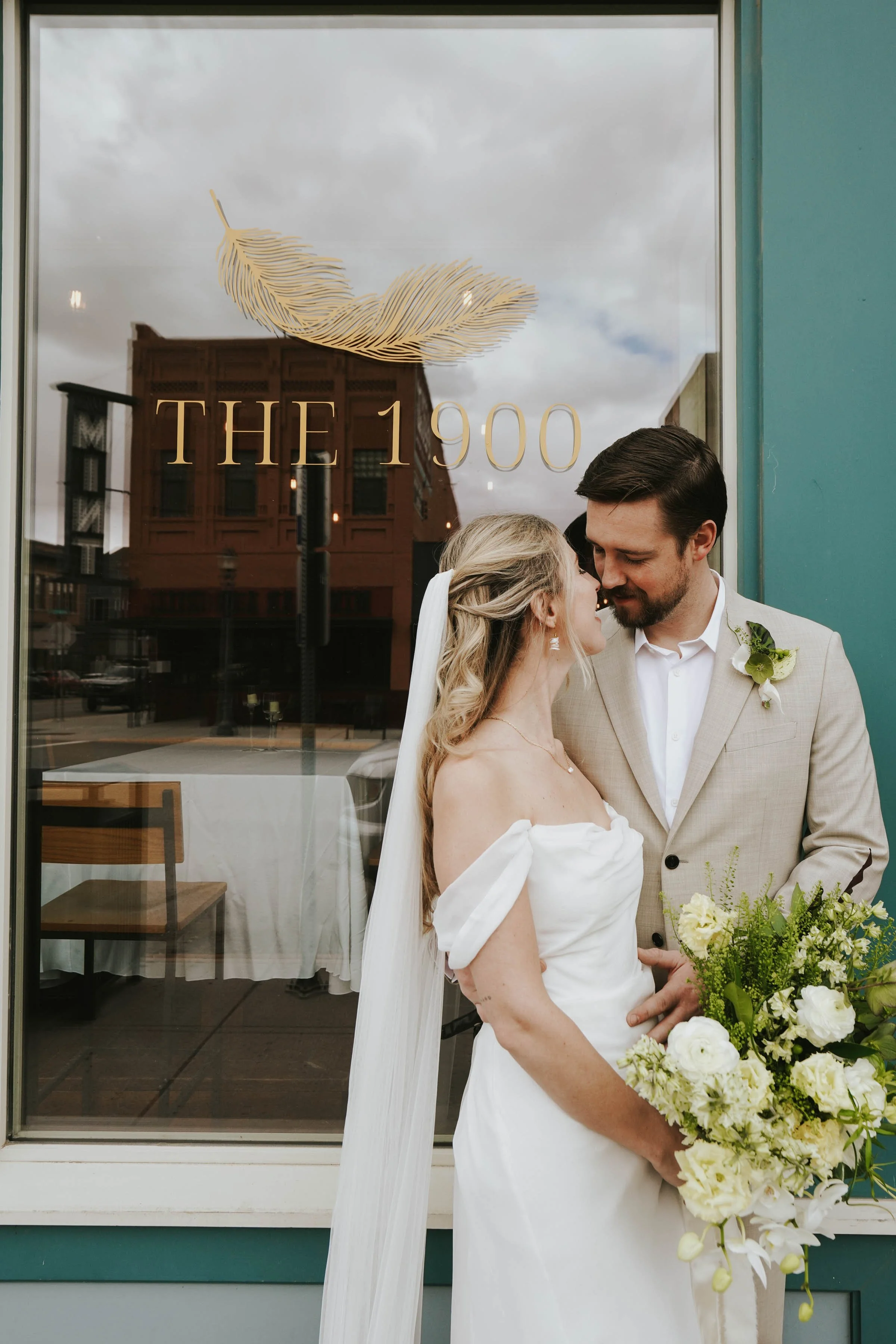 Bride and groom outside The 1900 wedding venue in Livingston Montana