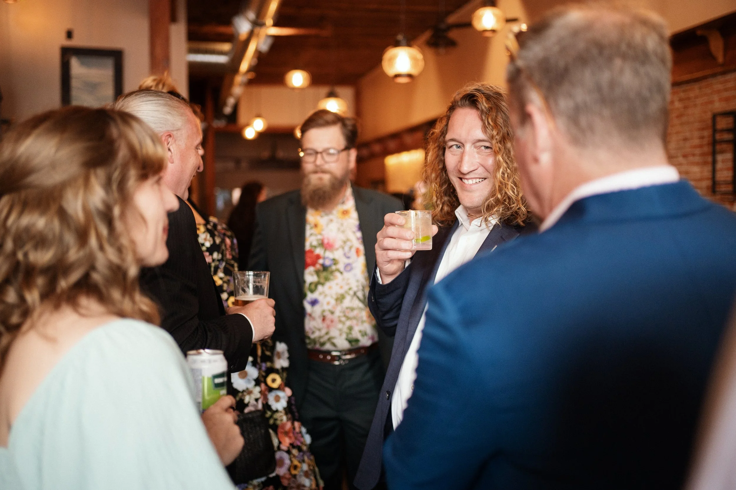 Guests enjoying drinks in the Parlor at The 1900 in Livingston Montana