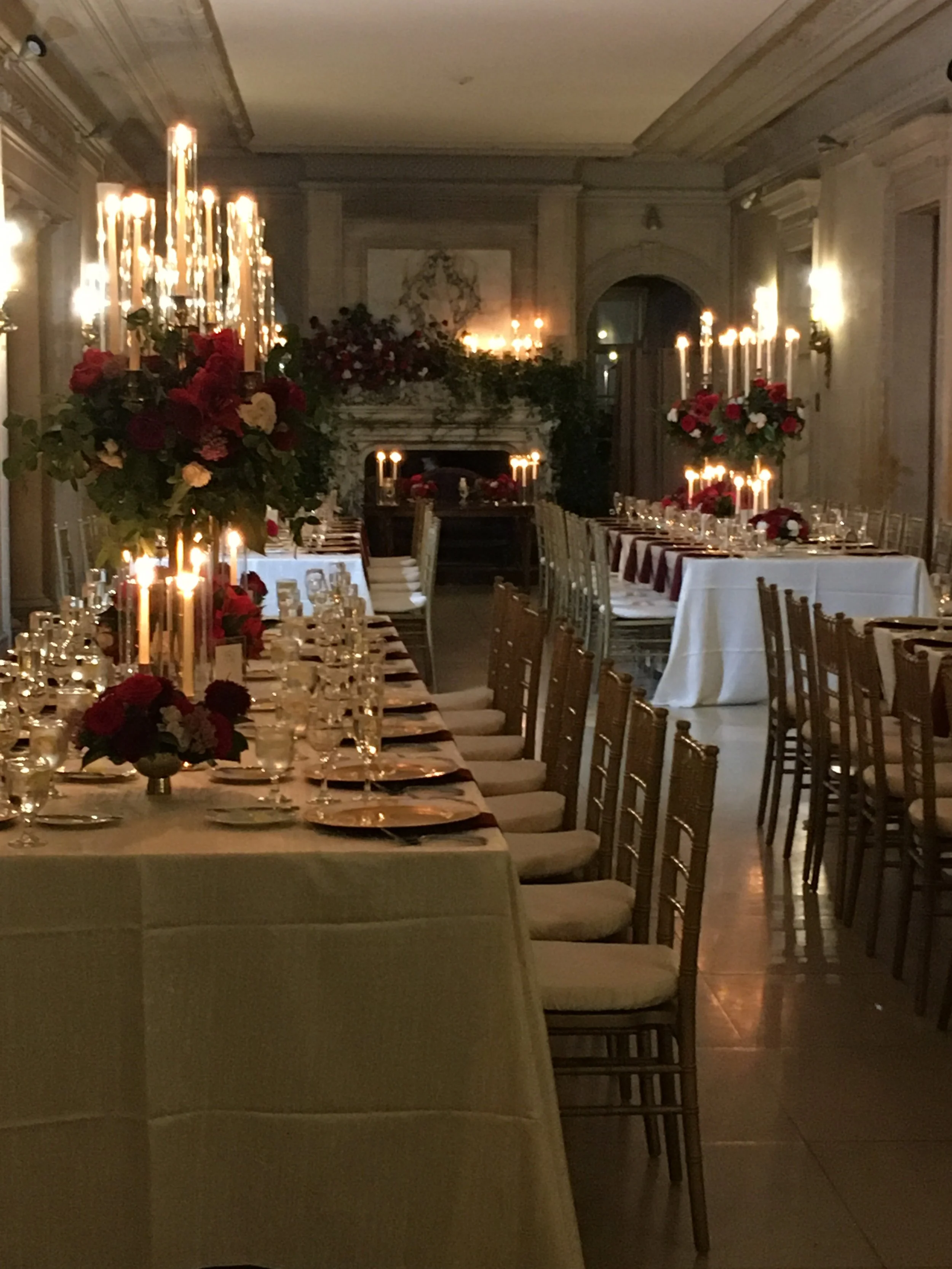 Candelabras and red roses. #Lifeinbloom did a magnificent job with the decor, and #AmyHarloe's vision was magical. 
