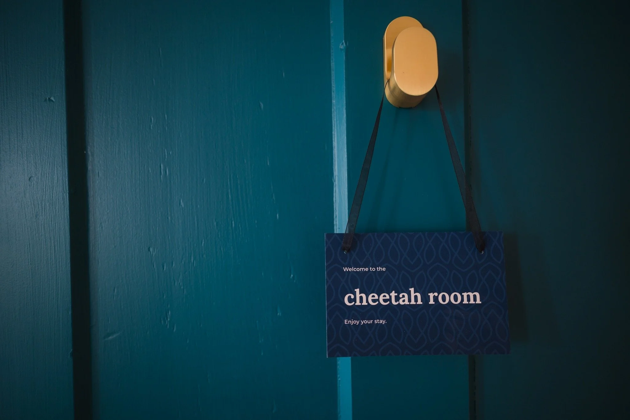 Beyond each turquoise door is a well appointed guest room with ensuite bathroom, luxury touches like heated towel racks, bidets, in-room Nespresso machines, fluffy duvets with 100% long staple cotton linens, and house-made chocolates to start your st