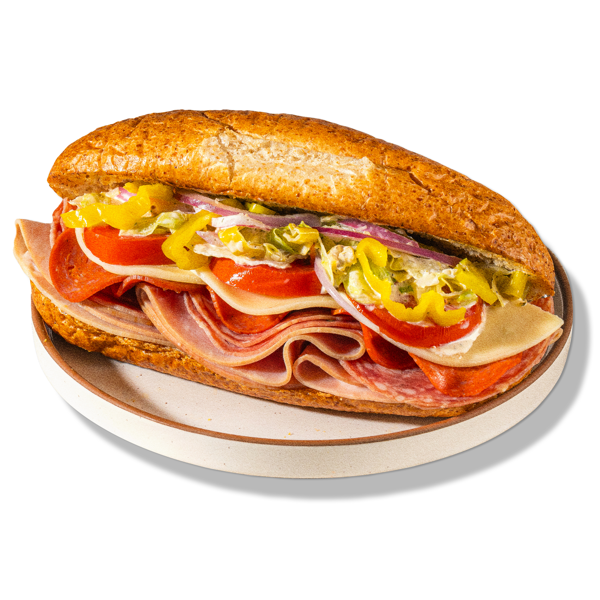 Sub sandwich with ham, roast beef, lettuce, tomato, pickles, onions, and yellow peppers in a toasted hoagie bun.