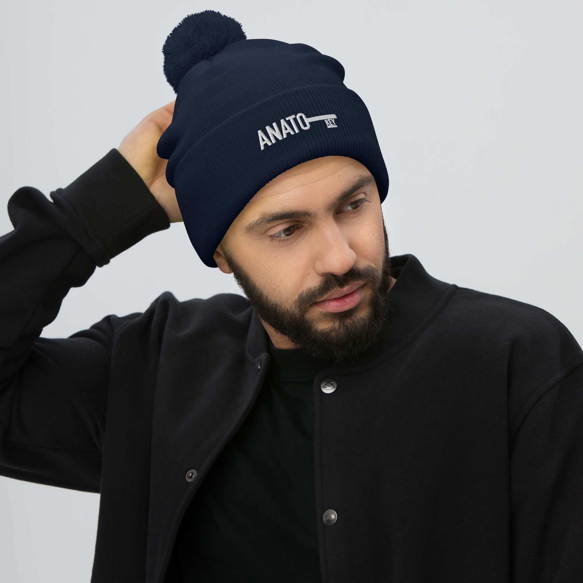 pom-pom-knit-cap-navy-front-65c4ea82c3299.jpg