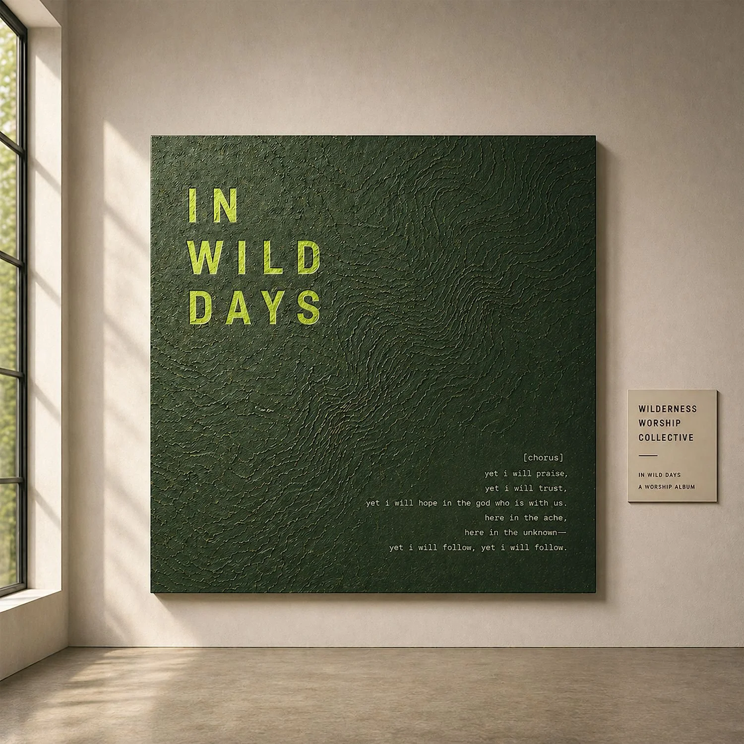 In Wild Days album artwork: a deep green textured canvas with the title in lime, hung on a gallery wall beside a small label