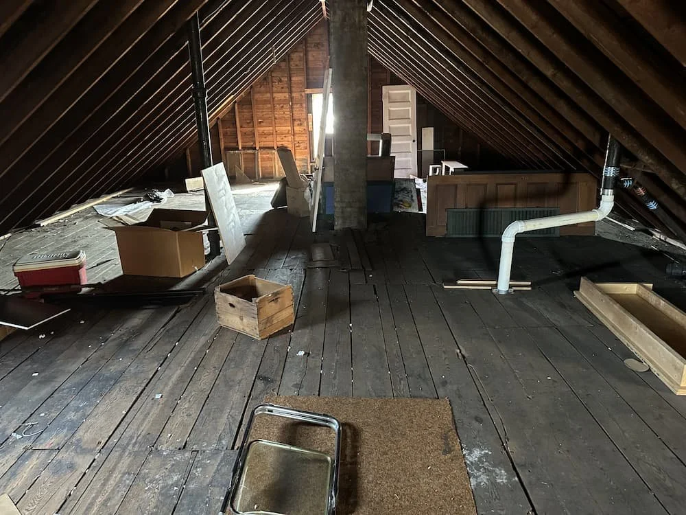 Attic full of junk before PurgePros attic cleanout