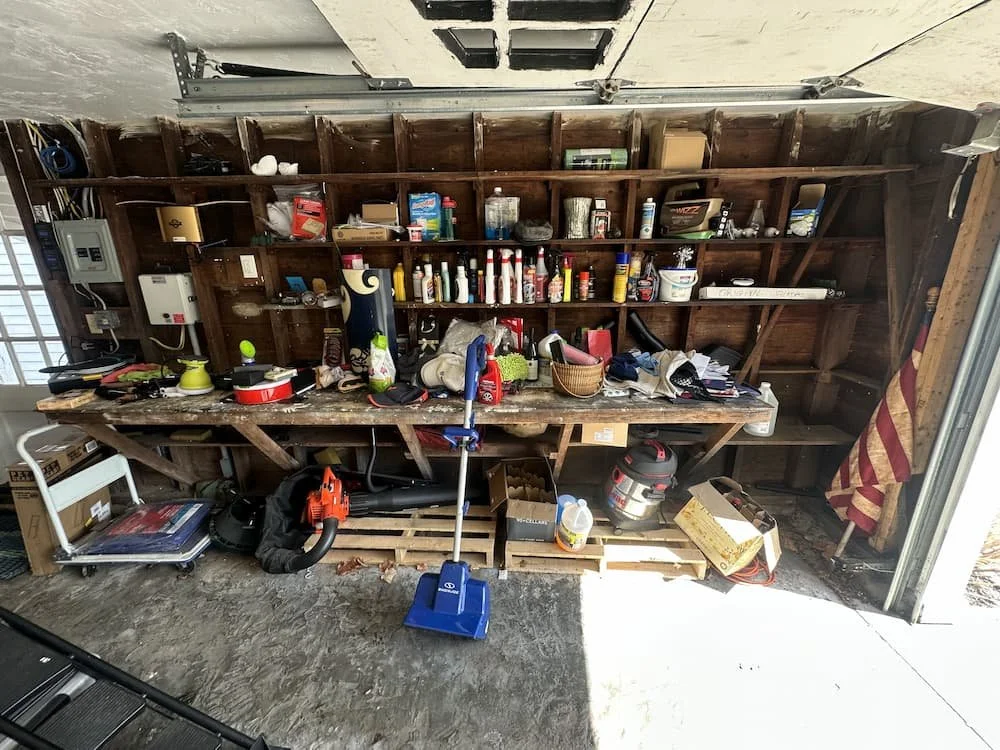 Cluttered garage before garage cleanout