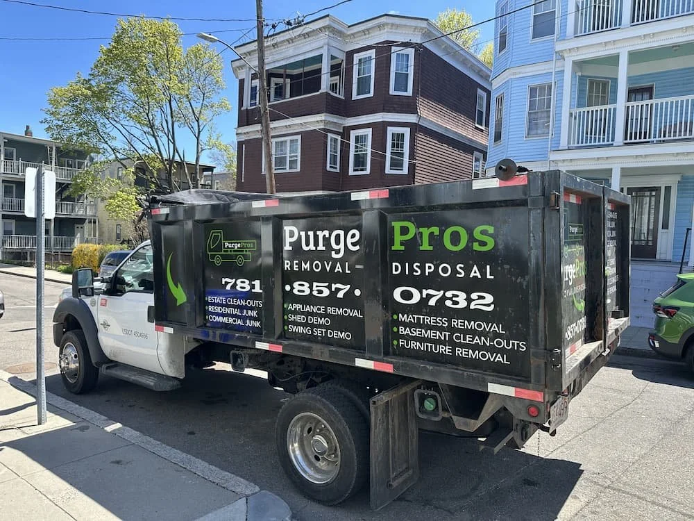 PurgePros truck in a residential neighborhood to show residential junk removal services in Hingham, MA