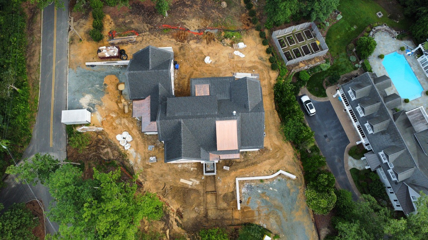 Every project starts with a story. For this one, the name came easy &mdash; Project Blue &mdash; a nod to the original home that once sat beneath the trees. After a full tear down in Chapel Hill, new foundations are in place, framing is up, and the v