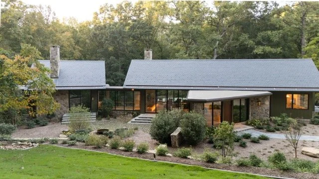 Set against a wooded backdrop, this custom home was designed by @arcade_architecture_interiors to feel rooted in nature. We helped bring exactly what our clients envisioned to fruition: a modern retreat that feels connected to its surroundings.

Phot