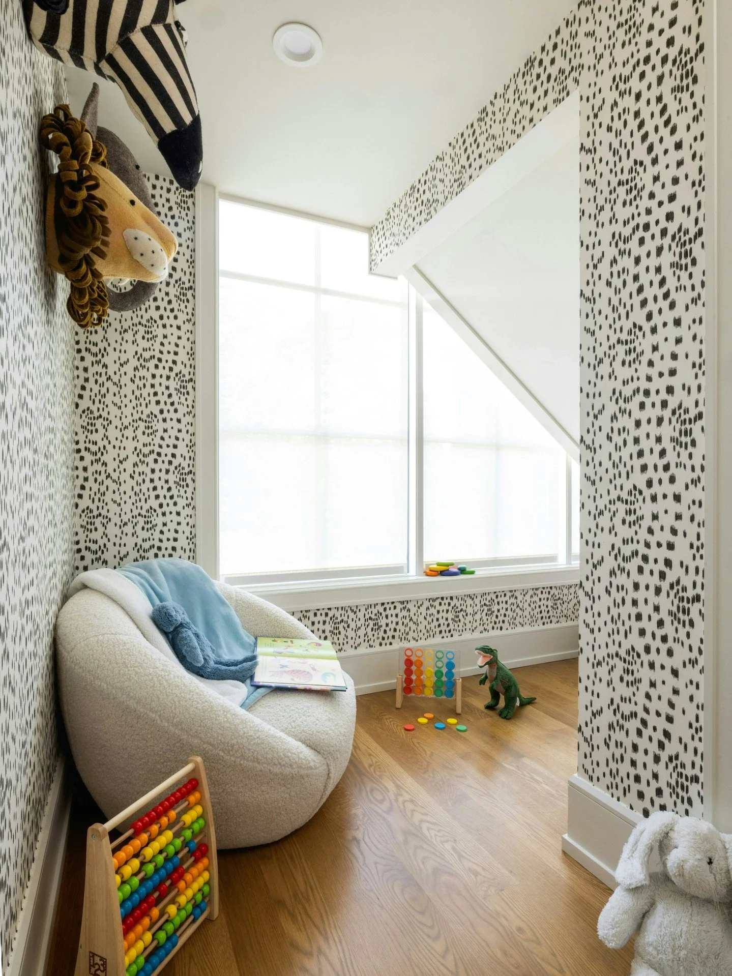 Even the smallest spaces deserve intention. Here, the area beneath the stairs became a light-filled play spot instead of unused square footage.

Photography: @auralakephotography
.

.

Vendors: @csmarble | @fitchlumber | @clarkhalldoors | @pinehallbr