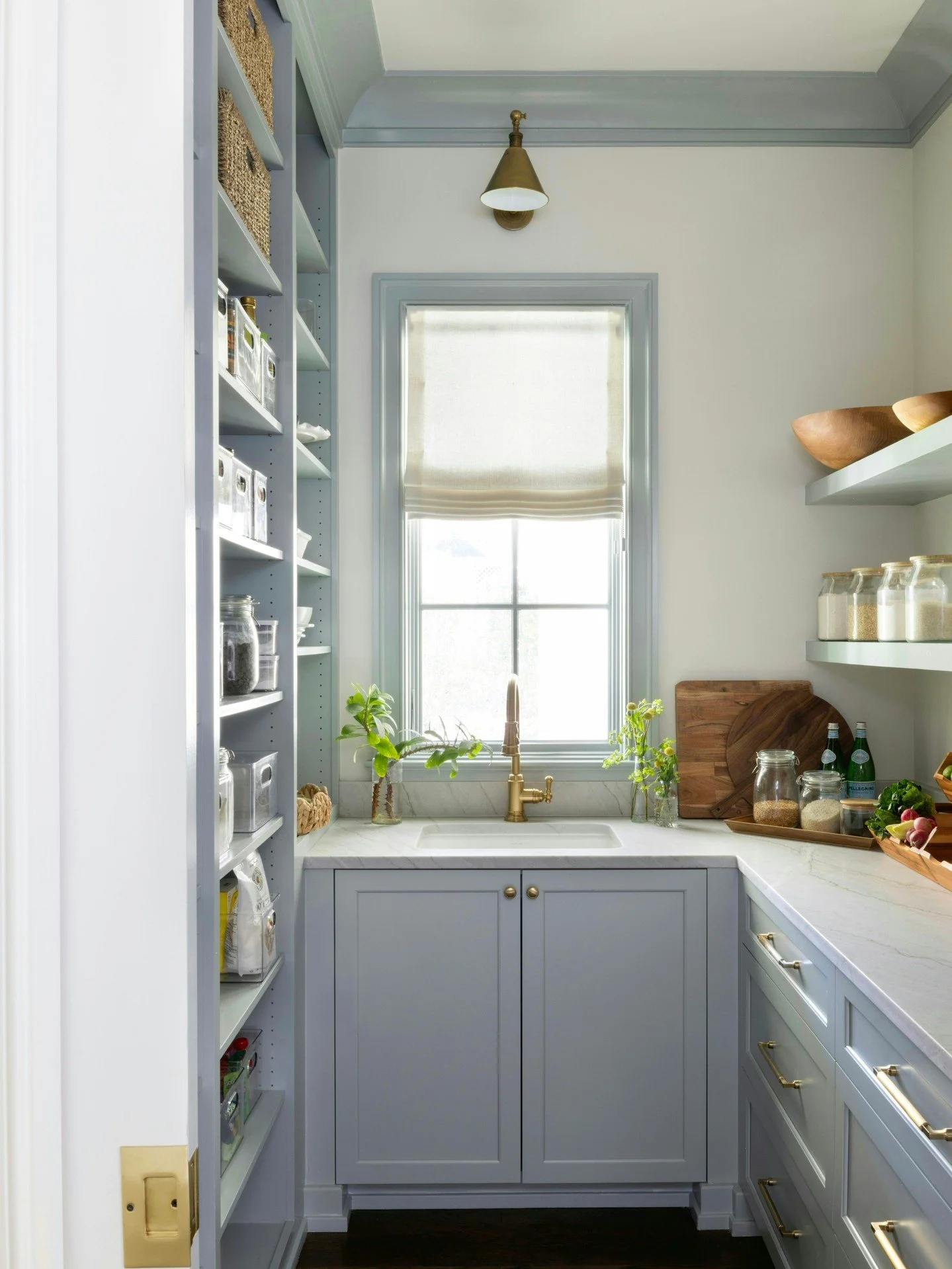 Organization is built into our Design Build process from the very beginning. By listening to our clients and asking the right questions early on, we create spaces like this pantry, where every detail is intentionally designed for function and ease.

