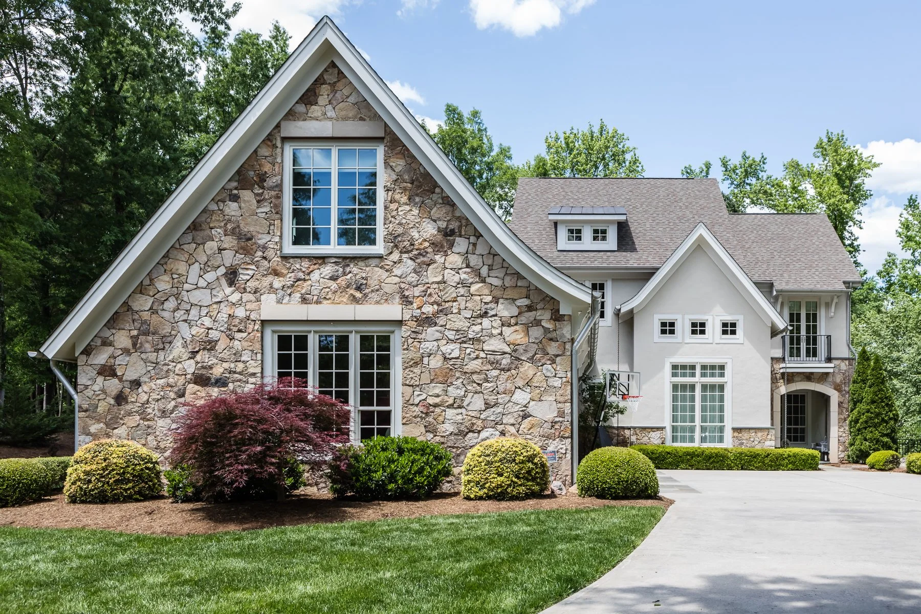 Modern transitional custom home showcasing coordinated design-build planning and timeless exterior finishes, Design-Build Custom Home with Timeless Craftsmanship