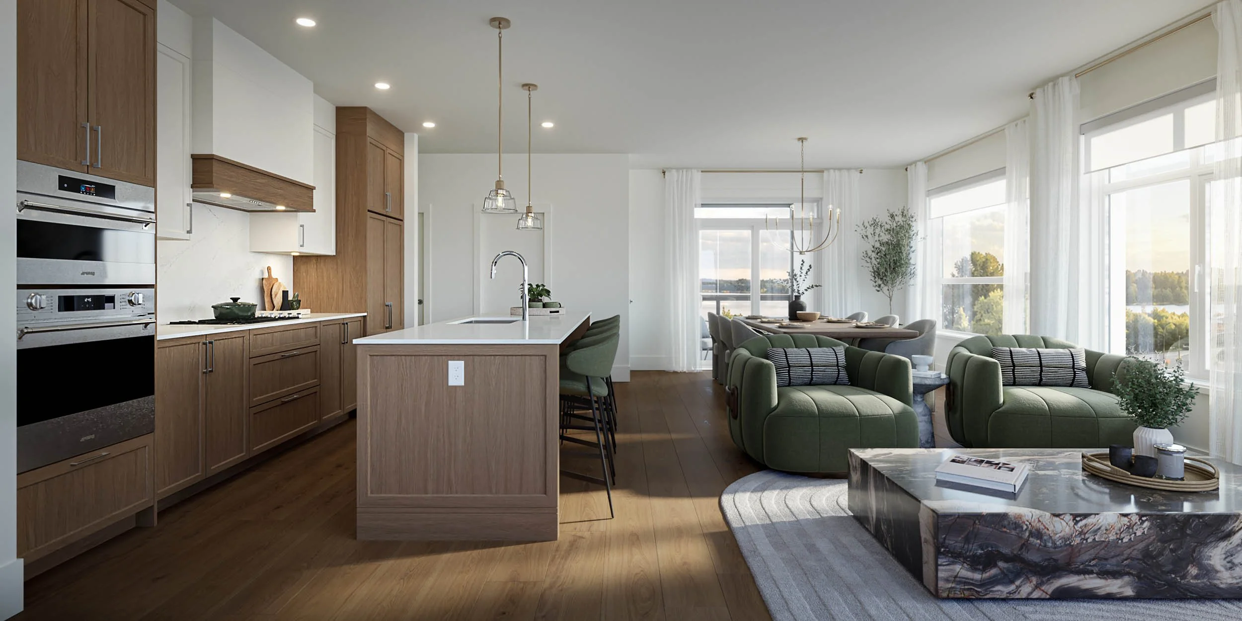 Open plan great room with a wood kitchen and island at one end, green lounge seating in the middle and a dining table beside floor to ceiling windows