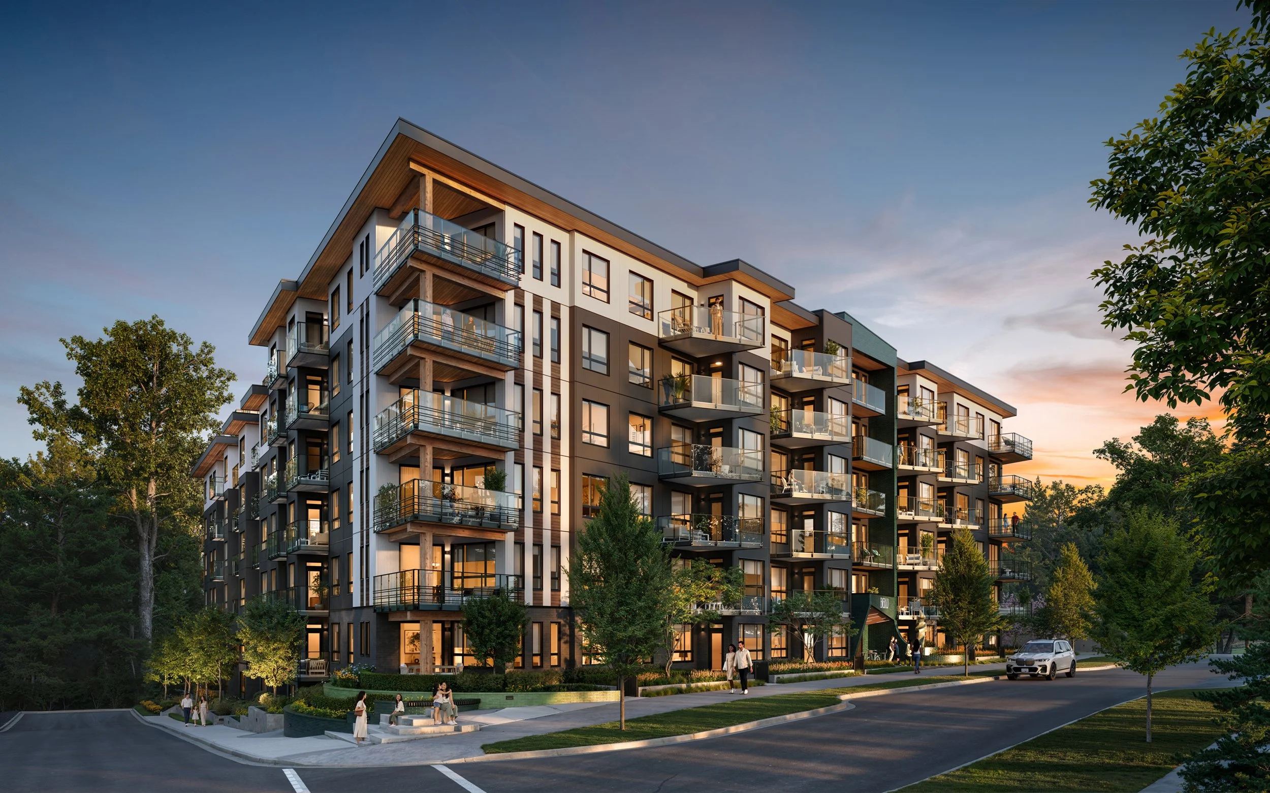 A six-storey condominium at dusk, its corner stepping out in timber and dark cladding above lit windows and planted balconies, with people on the entry plaza and mature trees along the street