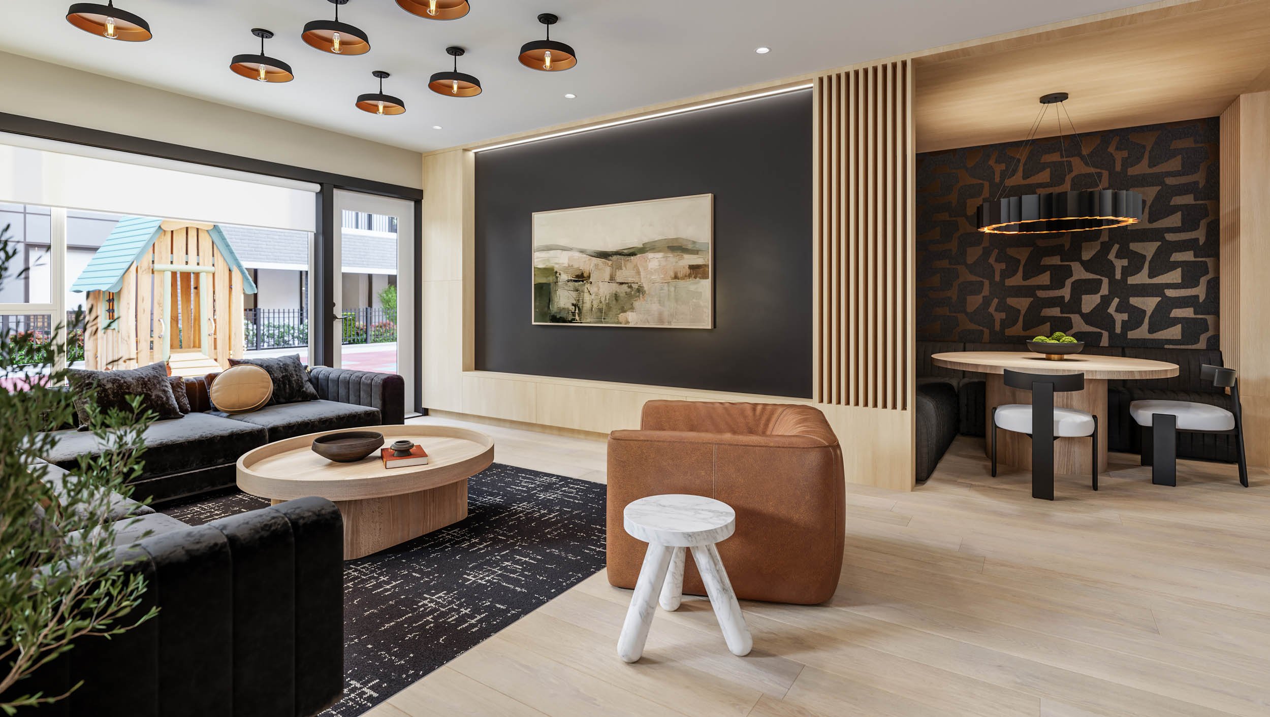 Amenity lounge with a long sectional sofa, a slatted timber wall, pendant lights and a dining nook