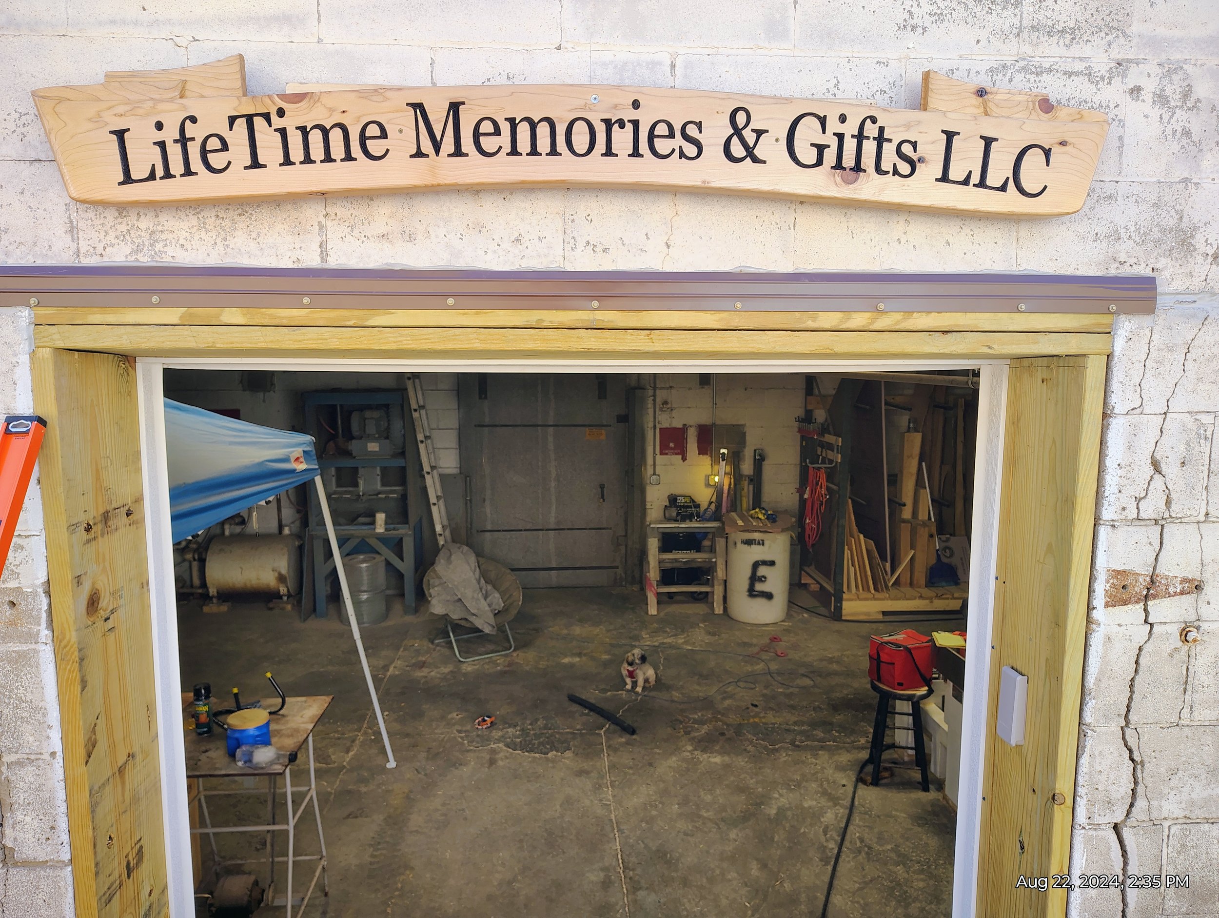 New Replacement Shop Sign Installed above Entrance