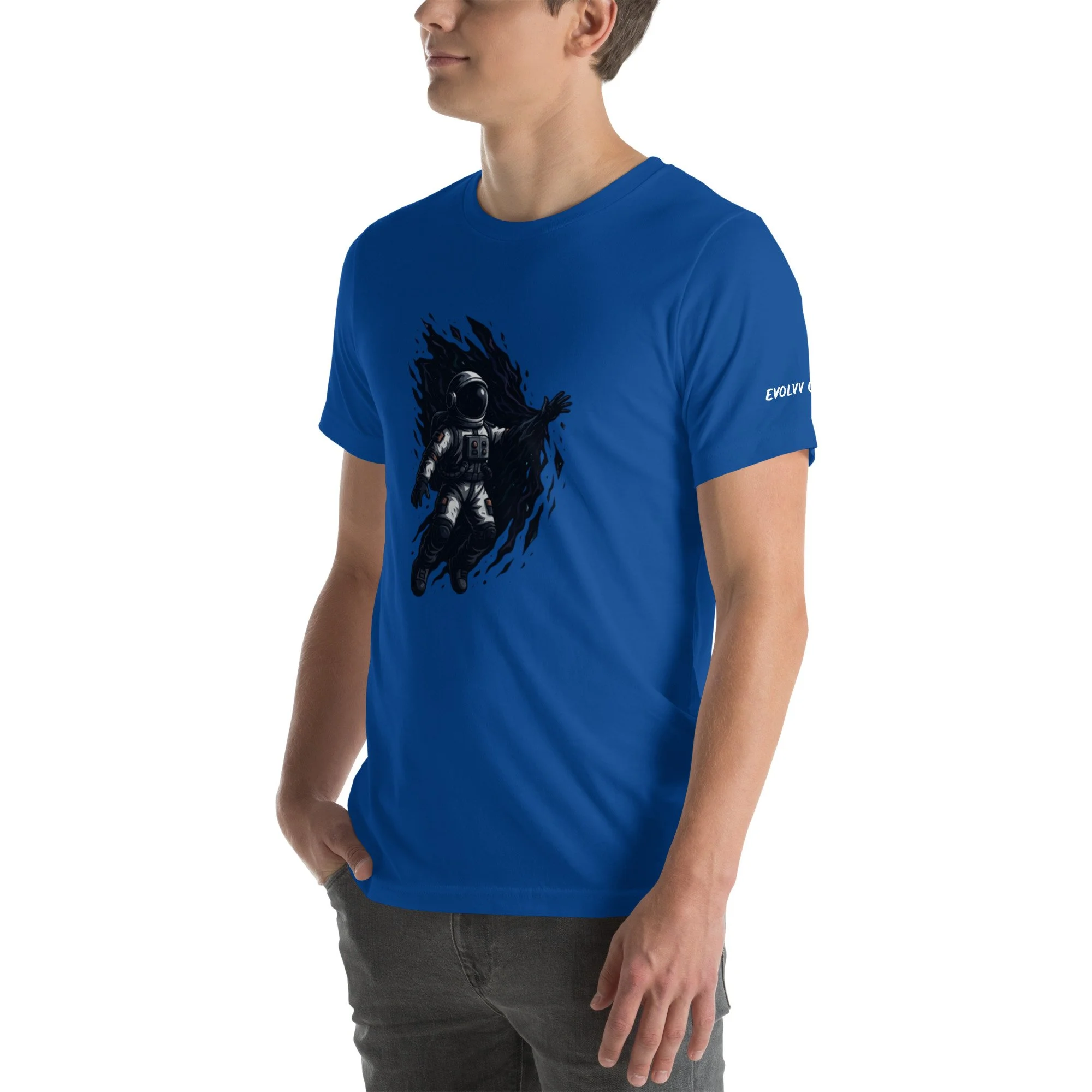 Angled view of the blue “Into the Unknown” graphic t-shirt on model, showing astronaut design across the chest.