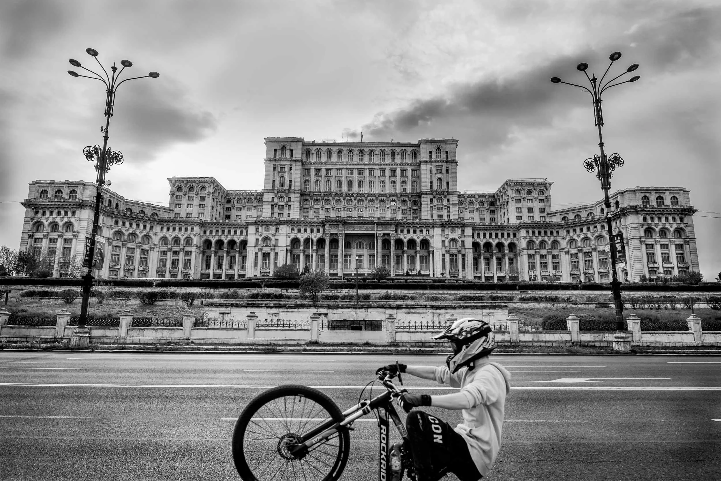 street-bucharest-royal-palace-cycle-wheelie-black-and-white-marc-stanford.jpg