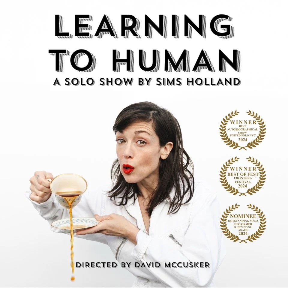 white woman in her 30s with tangled dark hair, wearing a white jumpsuit. mouth open in an "O" shape, pouring coffee from a cup past the saucer and onto the floor