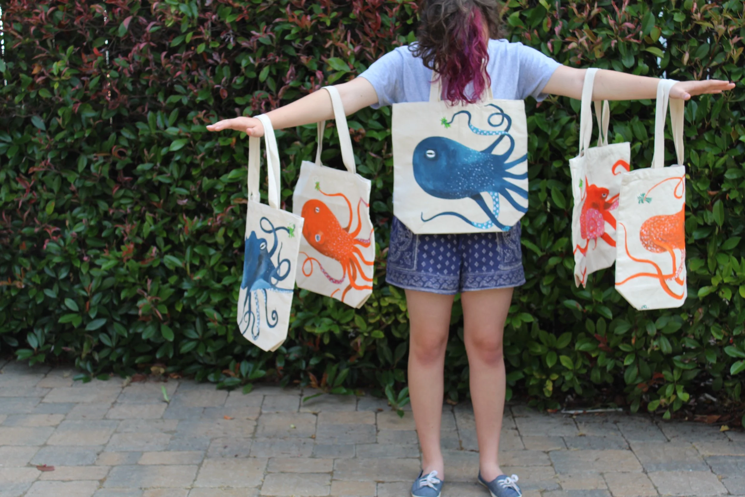 market bags painted with octopi