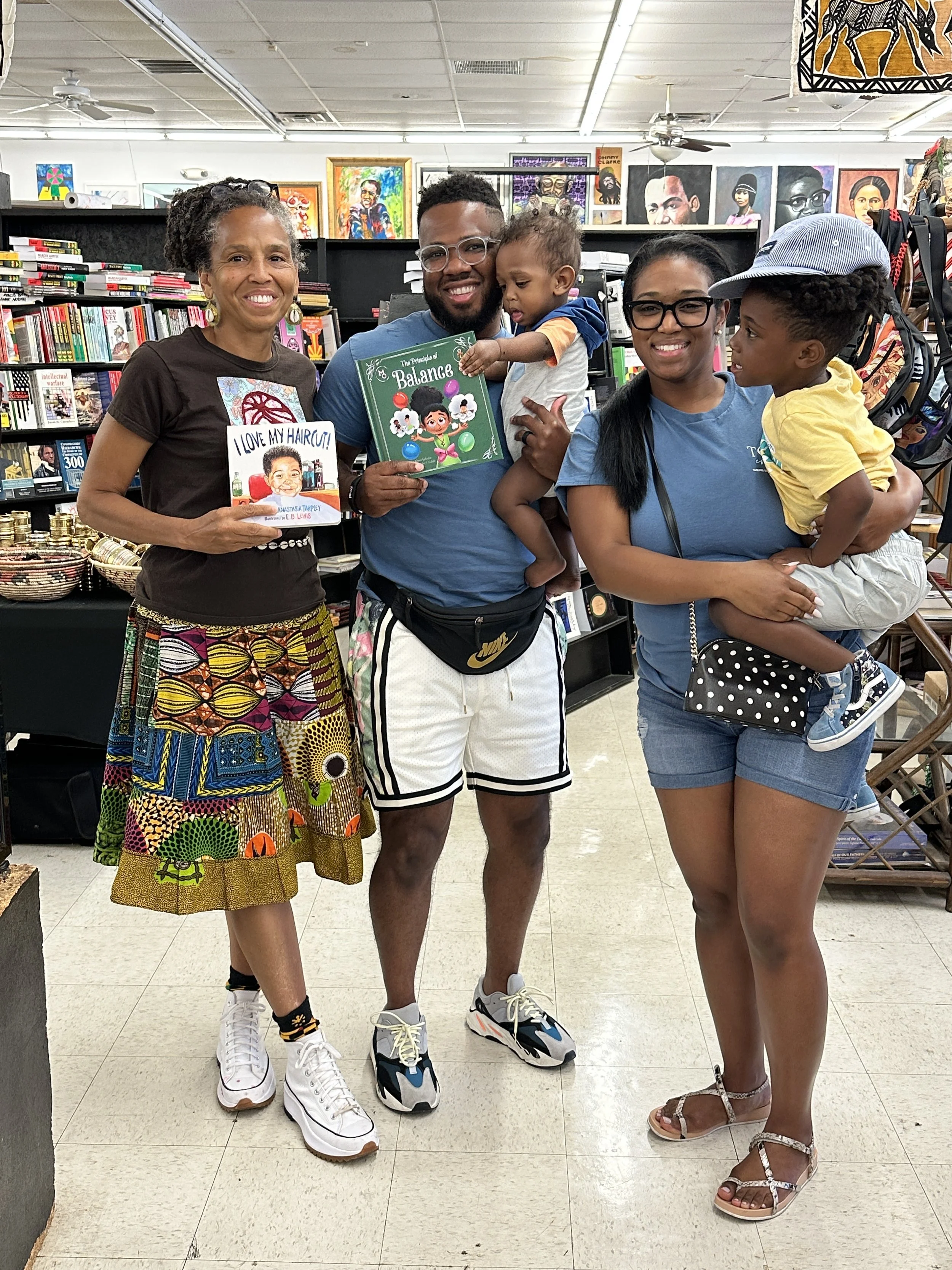Our co-founders visiting Pan-African Connection with owner Akwete Tyehimba.