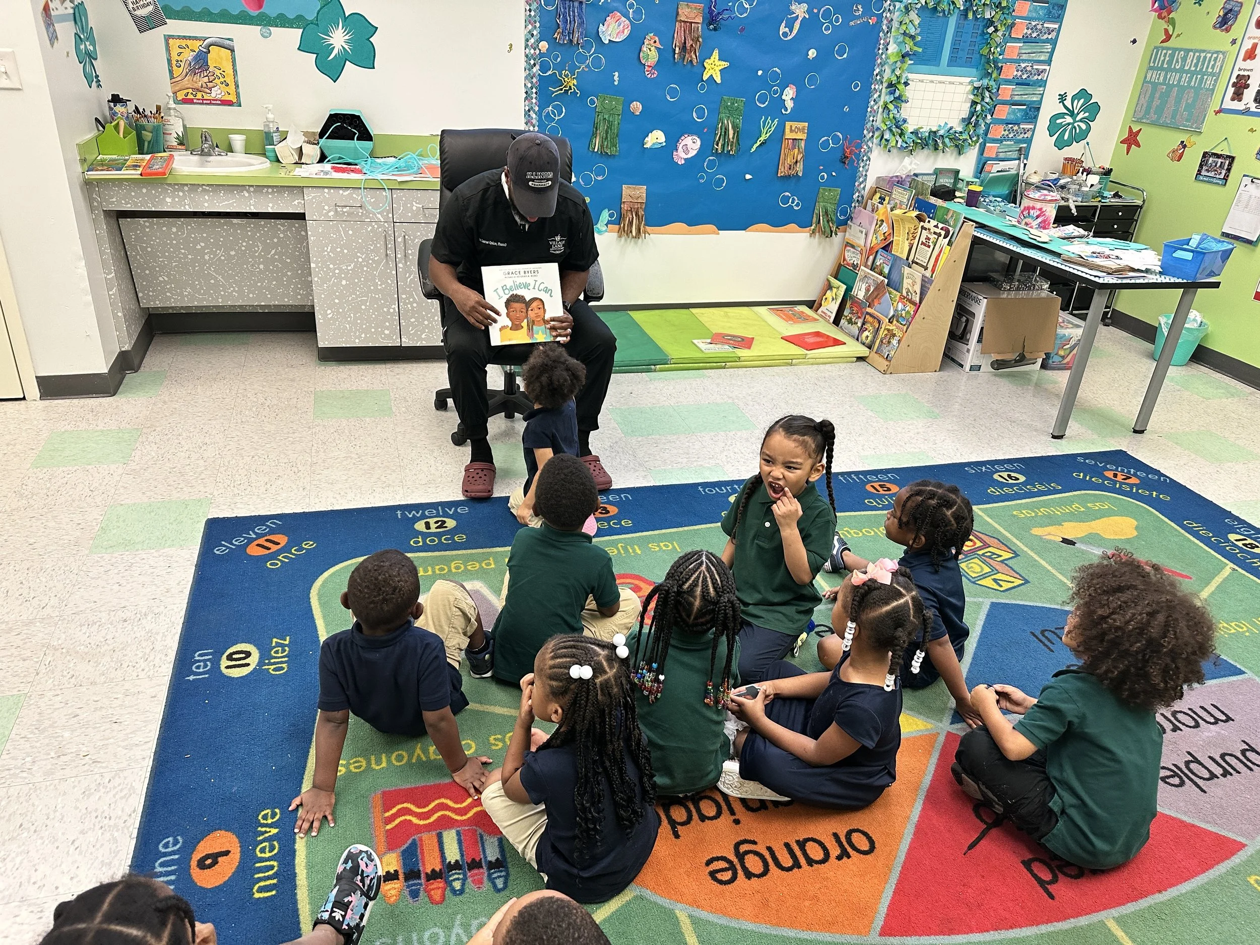 Volunteer reading to students
